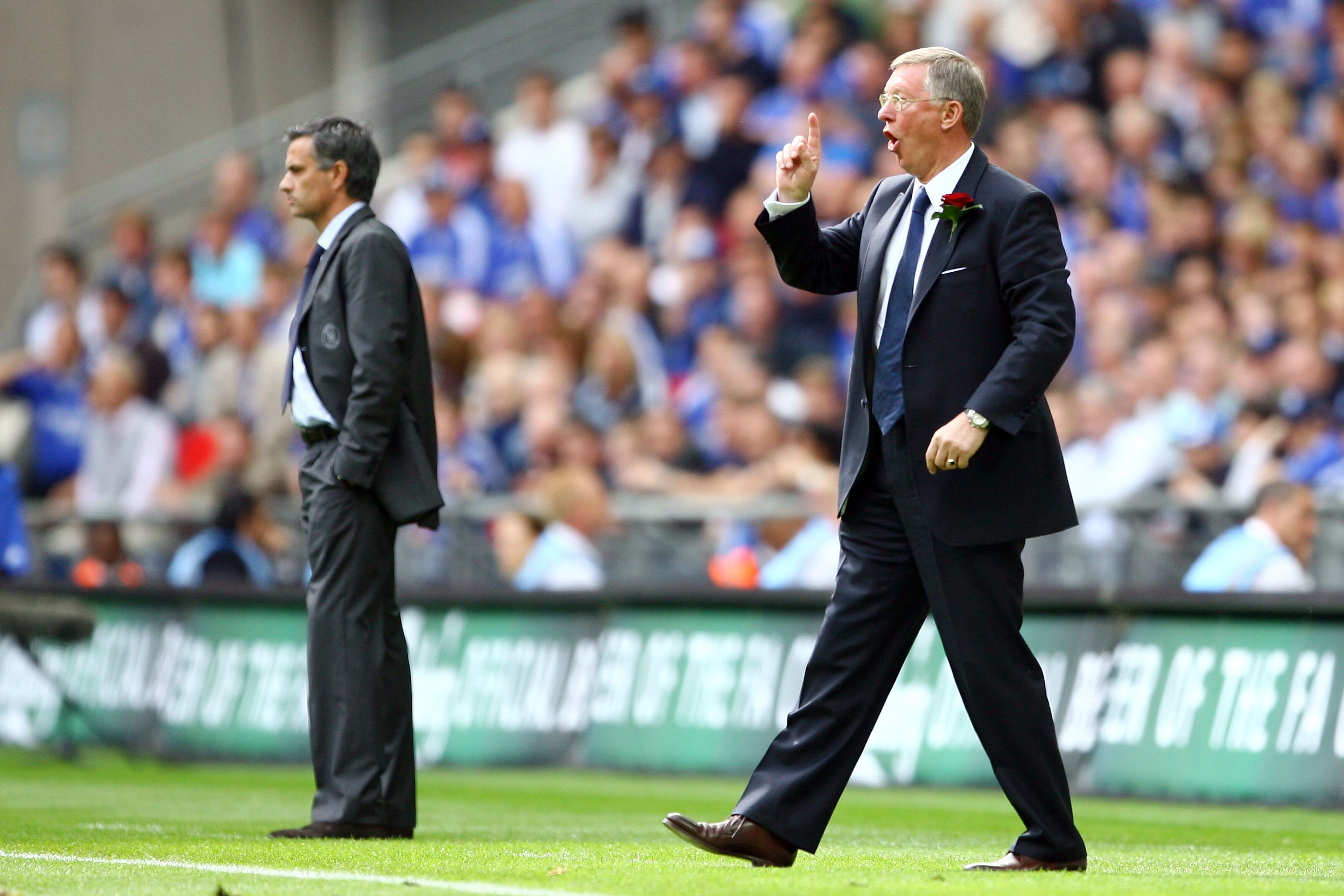 LONDON - MAY 19:  Sir Alex Ferguson manager of Manchester United gestures as Jose Mourinho manager of Chelsea looks on during the FA Cup Final match sponsored by E.ON between Manchester United and Chelsea at Wembley Stadium on May 19, 2007 in London, Engl