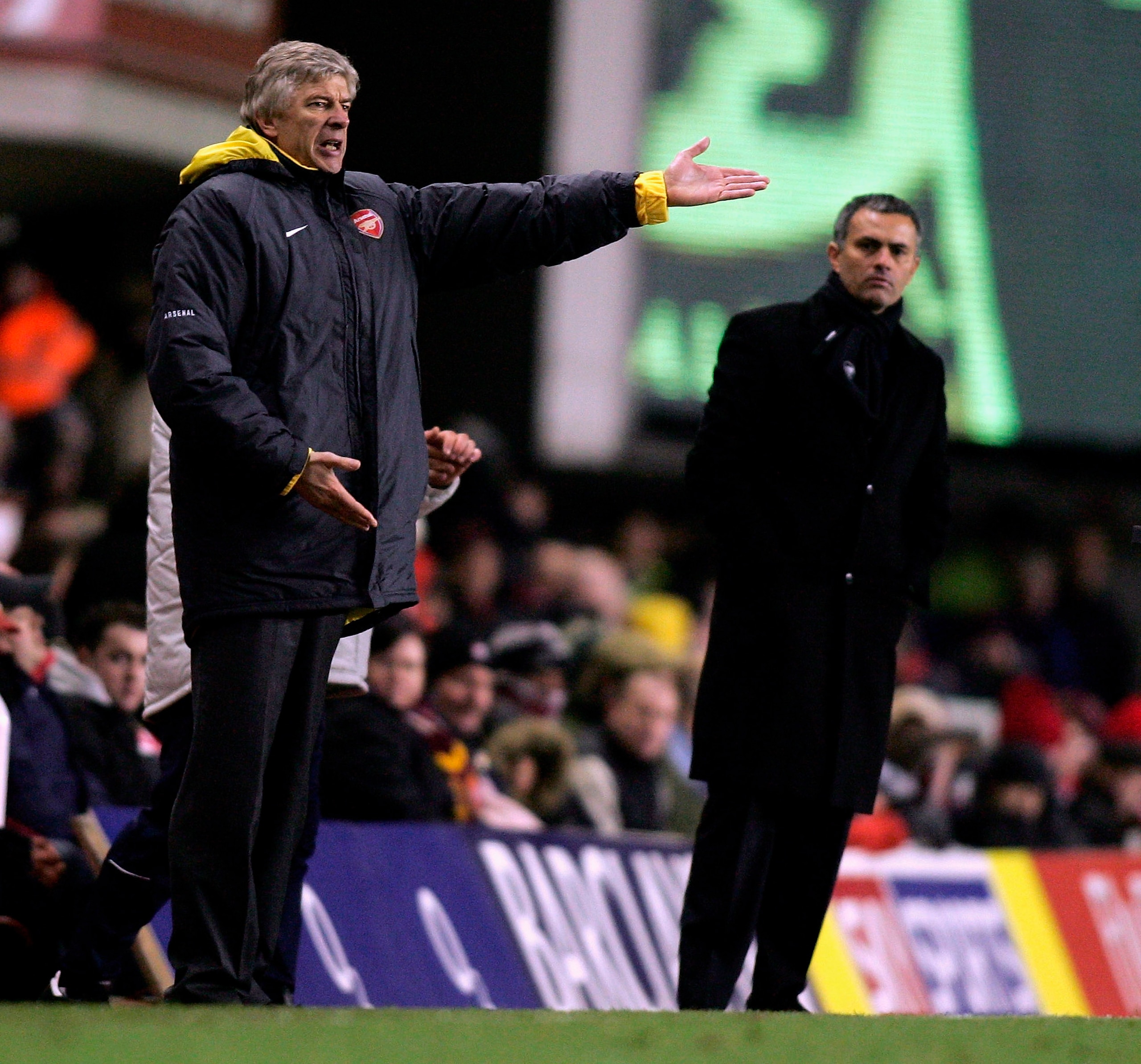 LONDON - DECEMBER 18:  Arsenal Manager Arsene Wenger (L) and Chelsea Manager Jose Mourinho (R) give instructions from the sidelines during the Barclays Premiership match between Arsenal and Chelsea at Highbury on December 18, 2005 in London, England.  (Ph