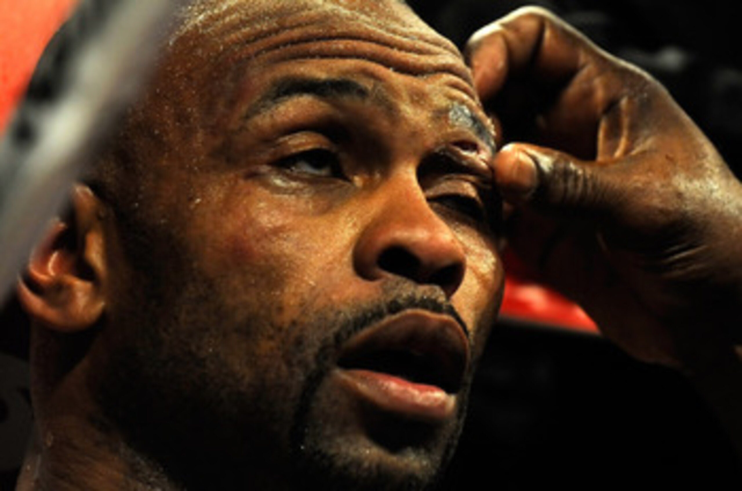 LAS VEGAS - APRIL 03:  Roy Jones Jr. has a  cut over his left eye tended to in his corner between rounds of his light heavyweight bout against Bernard Hopkins at the Mandalay Bay Events Center April 3, 2010 in Las Vegas, Nevada. Hopkins won by unanimous d
