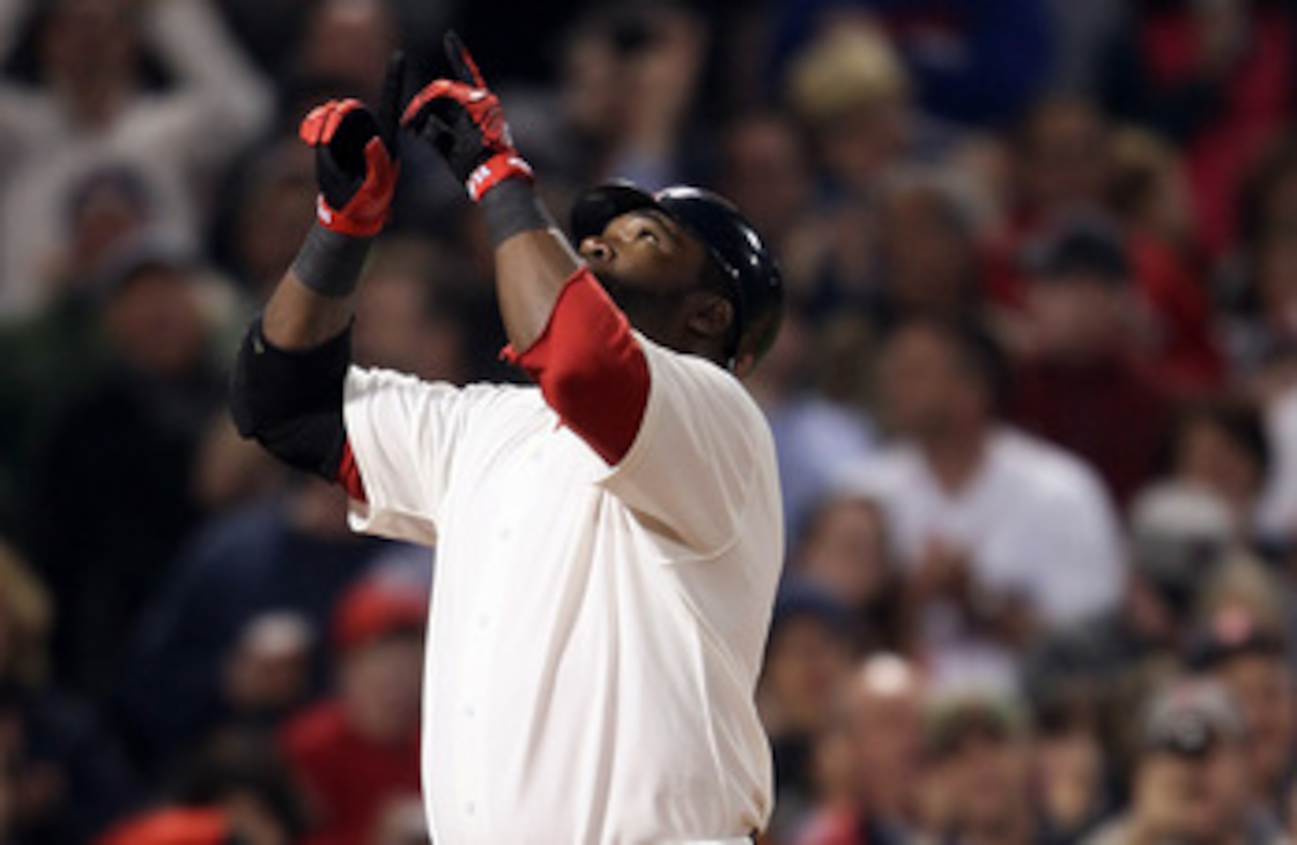 BOSTON, MA - MAY 21:  David Ortiz #34 of the Boston Red Sox celebrates his two run homer in the fourth inning against the Chicago Cubs on May 21, 2011 at Fenway Park in Boston, Massachusetts. Tonight the Chicago Cubs and the Boston Red Sox are wearing rep