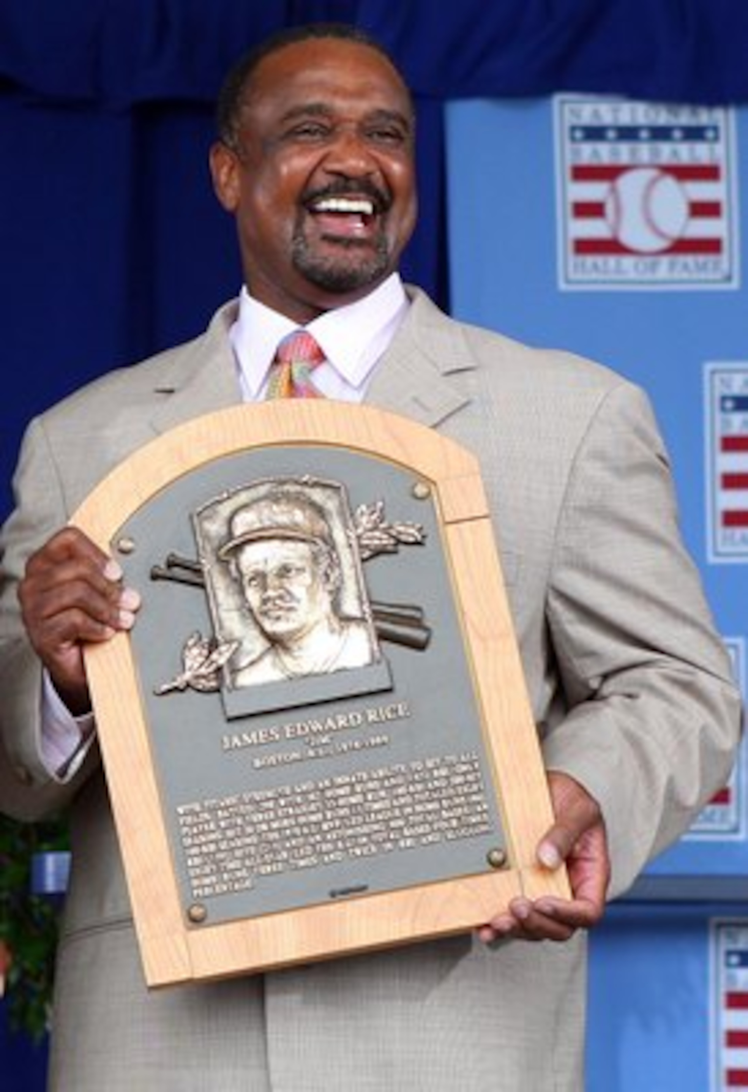 COOPERSTOWN, NY - JULY 26:  2009 inductee Jim Rice holds his plaque at Clark Sports Center after his induction into the Baseball Hall of Fame during the Baseball Hall of Fame induction ceremony on July 26, 2009 in Cooperstown, New York. Rice played his en