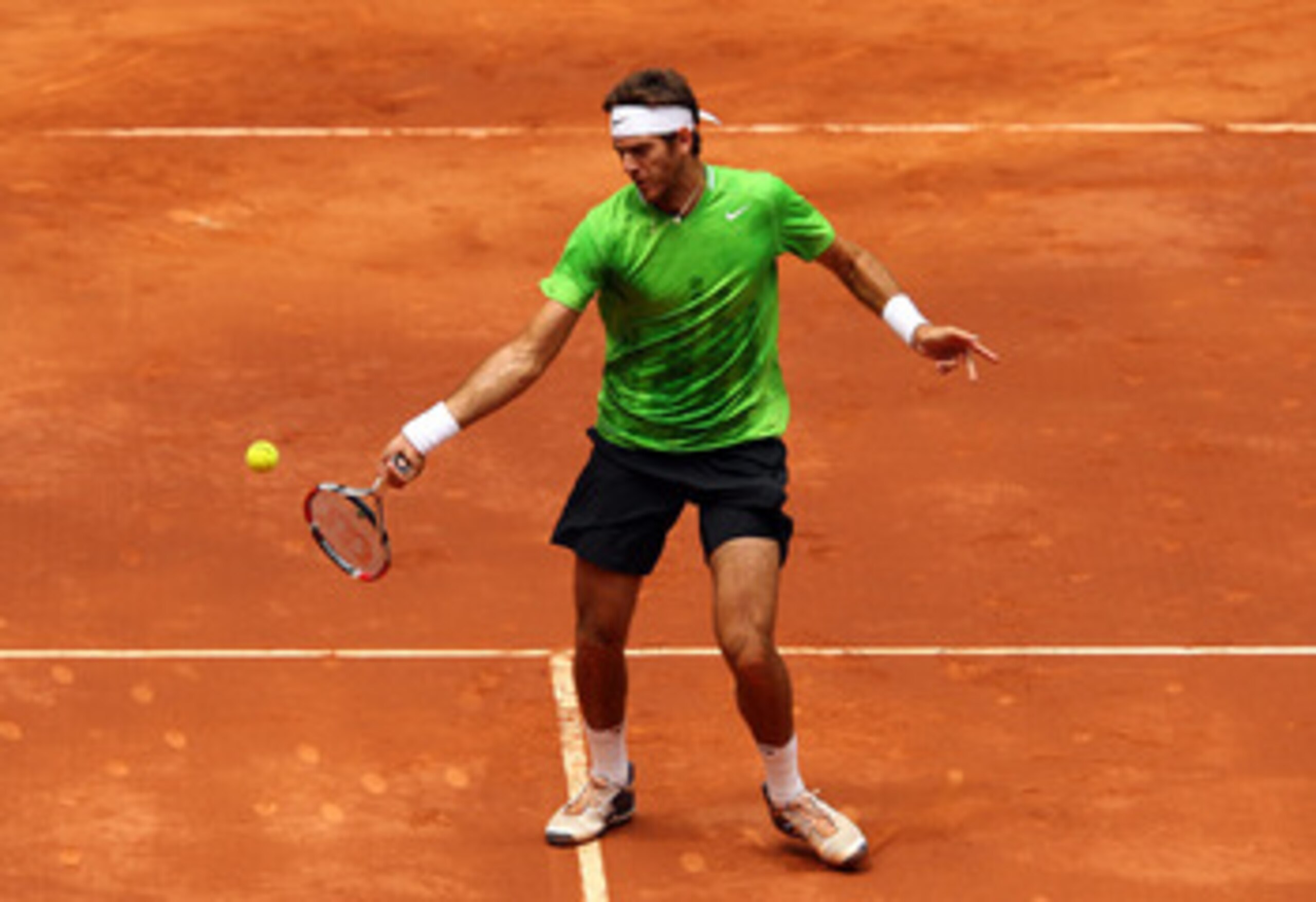 MADRID, SPAIN - MAY 03: Juan Martin Del Potro of Argentina plays a forehand in his match against Mikhail Youzhny of Russia during day four of the Mutua Madrilena Madrid Open Tennis on May 3, 2011 in Madrid, Spain. (Photo by Julian Finney/Getty Images) MADRID, SPAIN - MAY 03: Juan Martin Del Potro of Argentina plays a forehand in his match against Mikhail Youzhny of Russia during day four of the Mutua Madrilena Madrid Open Tennis on May 3, 2011 in Madrid, Spain. (Photo by Julian Finney/Getty Images)