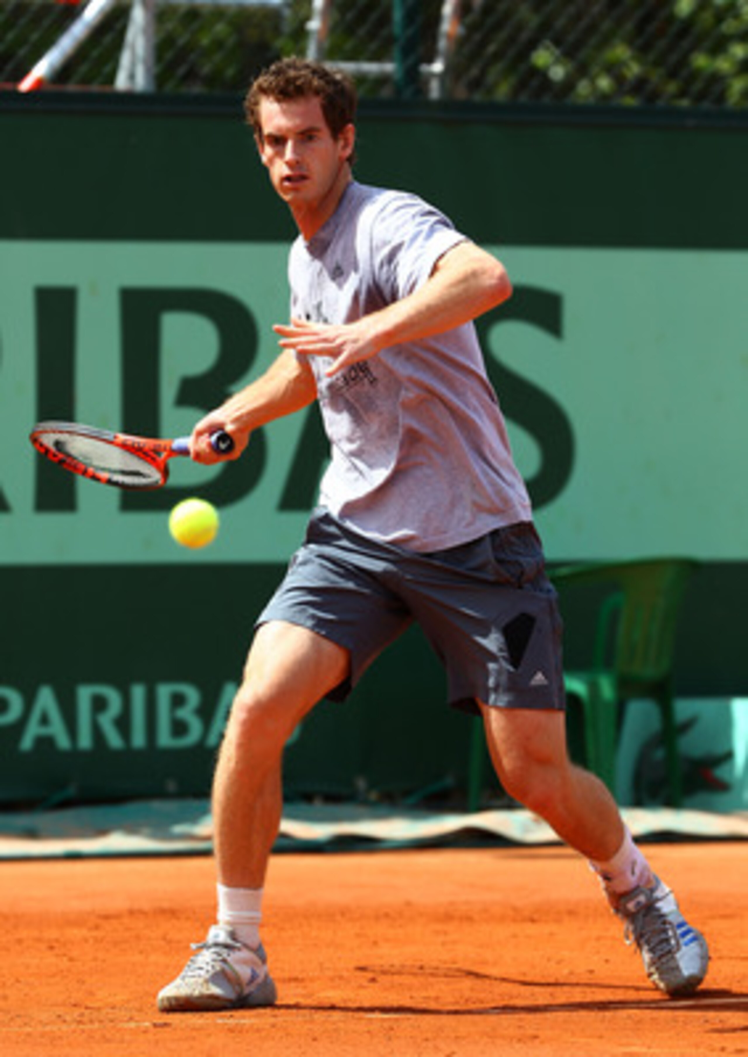 PARIS, FRANCE - MAY 22: Andy Murray of Great Britain plays a forehand during a practice session on day one of the French Open at Roland Garros on May 22, 2011 in Paris, France. (Photo by Clive Brunskill/Getty Images) PARIS, FRANCE - MAY 22: Andy Murray of Great Britain plays a forehand during a practice session on day one of the French Open at Roland Garros on May 22, 2011 in Paris, France. (Photo by Clive Brunskill/Getty Images)
