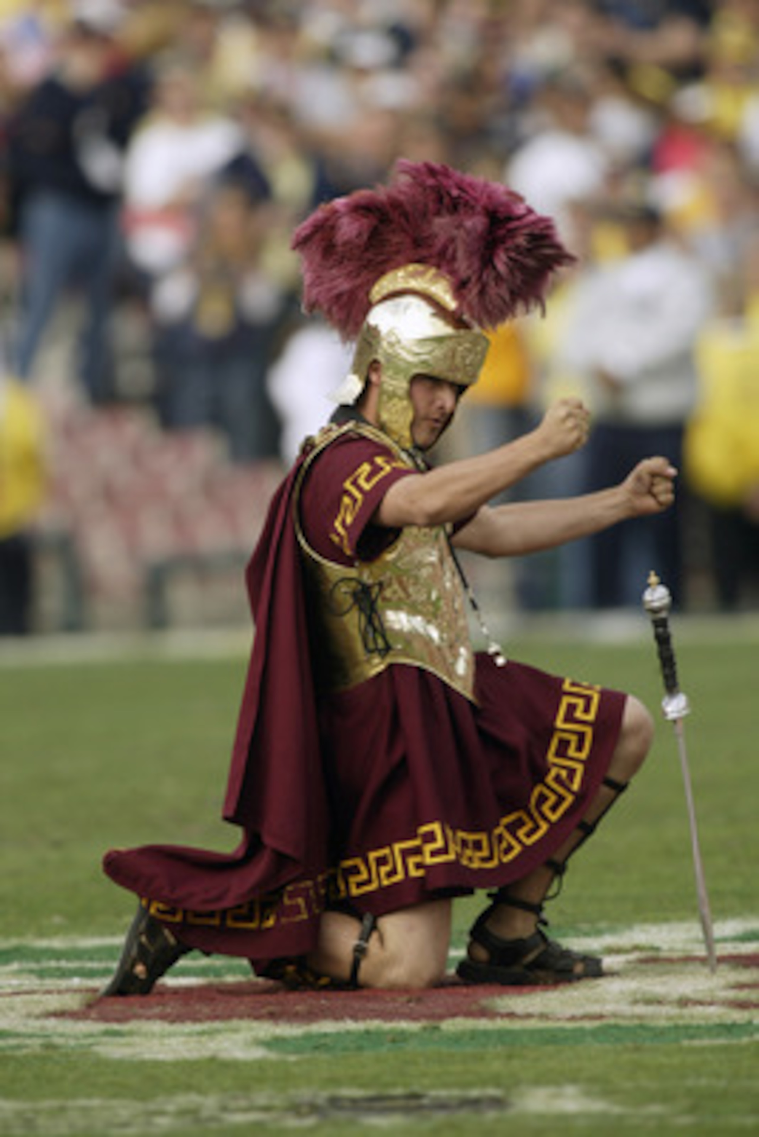 PASADENA, CA - JANUARY 1:  Tommy Trojan, mascot of the USC Trojans entertains the crowd during an intermission in the 2004 Rose Bowl game against the Michigan Wolverines on January 1, 2004 at the Rose Bowl in Pasadena, California. USC defeated Michigan 28