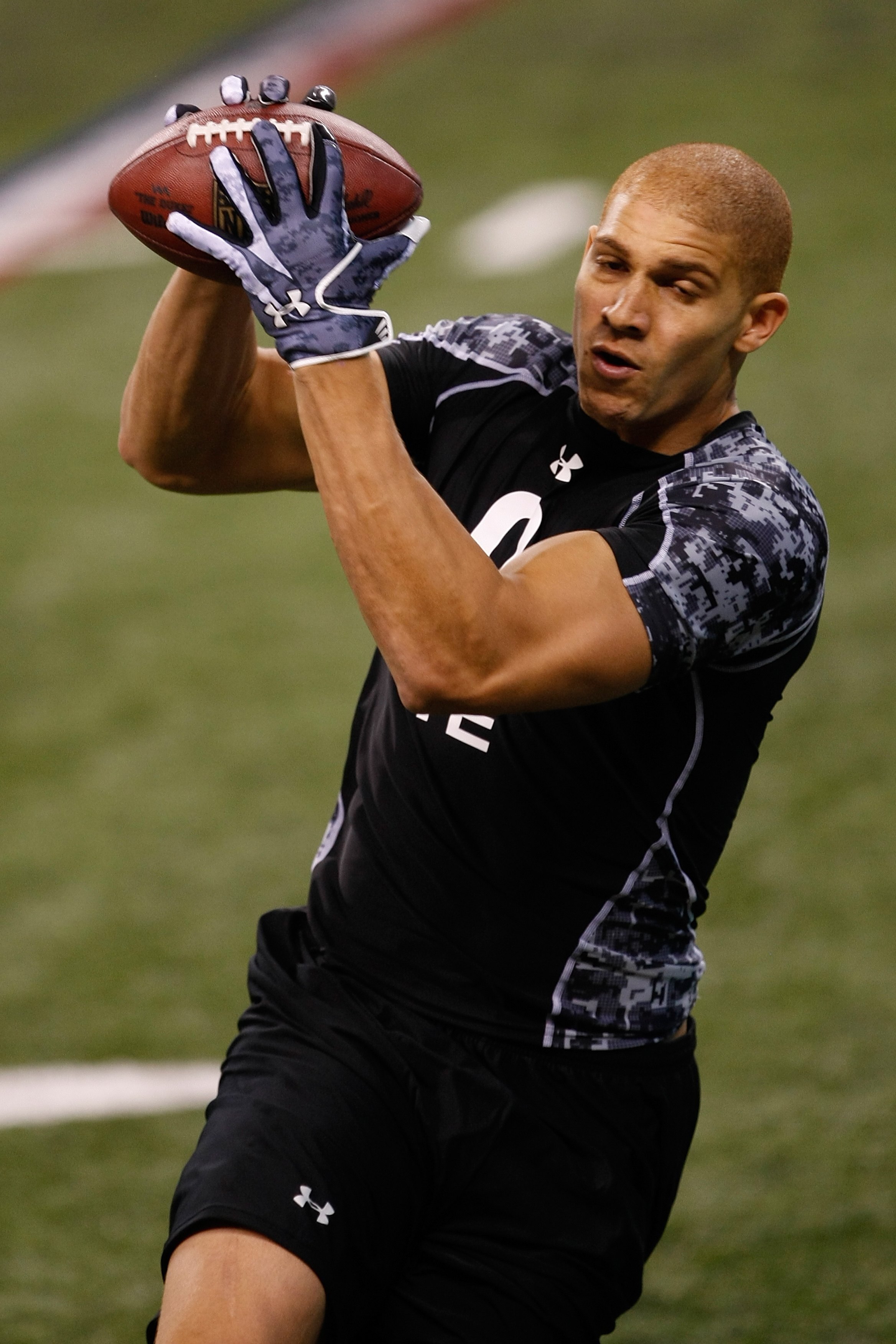 INDIANAPOLIS, IN - FEBRUARY 27: Tight end Jimmy Graham of Miami runs as he catches the football during the NFL Scouting Combine presented by Under Armour at Lucas Oil Stadium on February 27, 2010 in Indianapolis, Indiana. (Photo by Scott Boehm/Getty Image