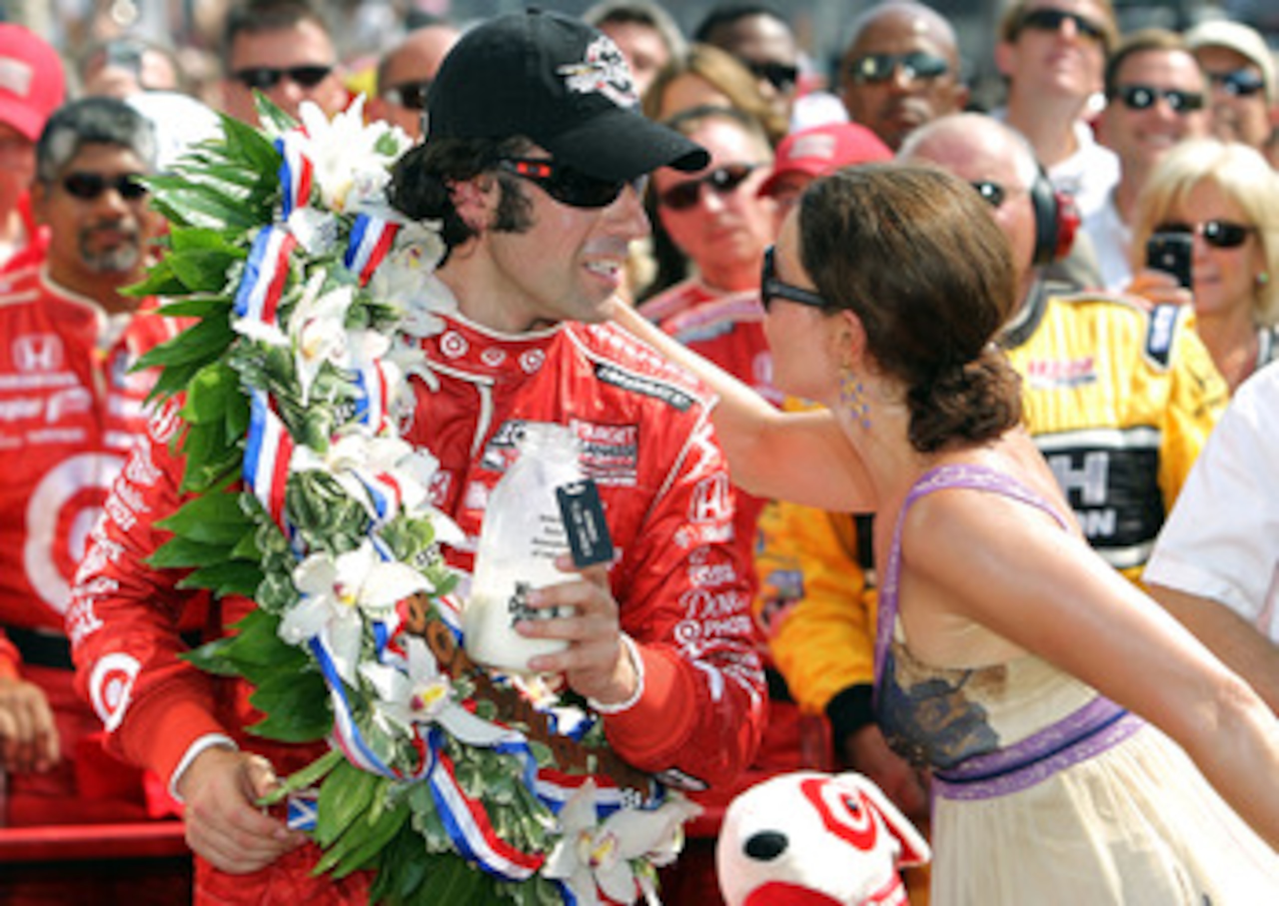 INDIANAPOLIS - MAY 30: Dario Franchitti of Scotland, driver of the #10 Target Chip Ganassi Racing Dallara Honda, celebrates with his wife Ashley Judd in victory lane after winning the IZOD IndyCar Series 94th running of the Indianapolis 500 at the Indian INDIANAPOLIS - MAY 30: Dario Franchitti of Scotland, driver of the #10 Target Chip Ganassi Racing Dallara Honda, celebrates with his wife Ashley Judd in victory lane after winning the IZOD IndyCar Series 94th running of the Indianapolis 500 at the Indian