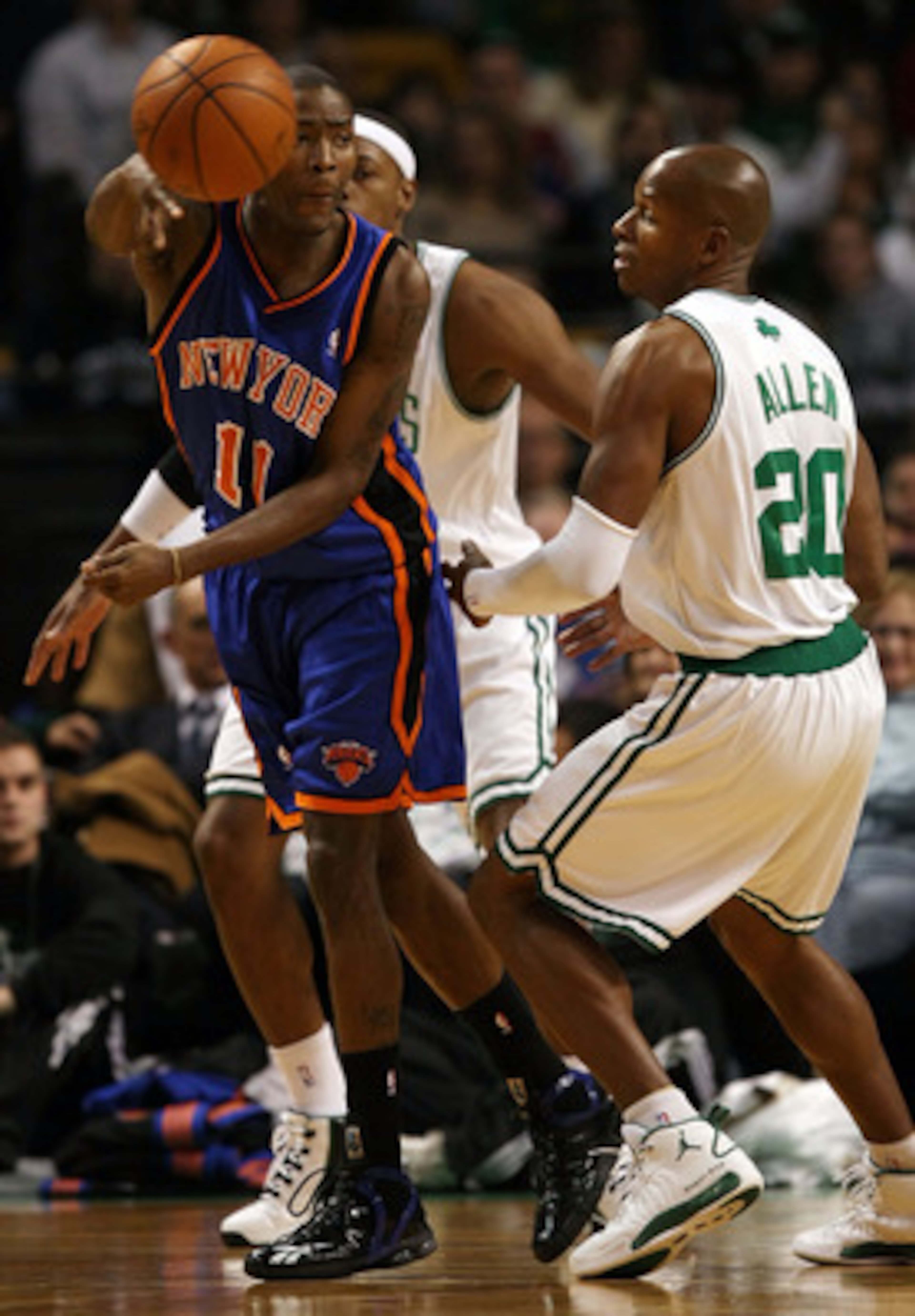 BOSTON - NOVEMBER 18:  Jamal Crawford #11 of the New York Knicks passes the ball as Ray Allen #20 of the Boston Celtics defends on November 18,  2008 at TD Banknorth Garden in Boston, Massachusetts. NOTE TO USER: User expressly acknowledges and agrees tha