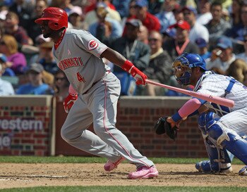 CHICAGO, IL - MAY 08: Brandon Phillips #4 of the Cincinnati Reds hits the ball against the Chicago Cubs at Wrigley Field on May 8, 2011 in Chicago, Illinois. The Reds defeated the Cubs 2-0. (Photo by Jonathan Daniel/Getty Images)