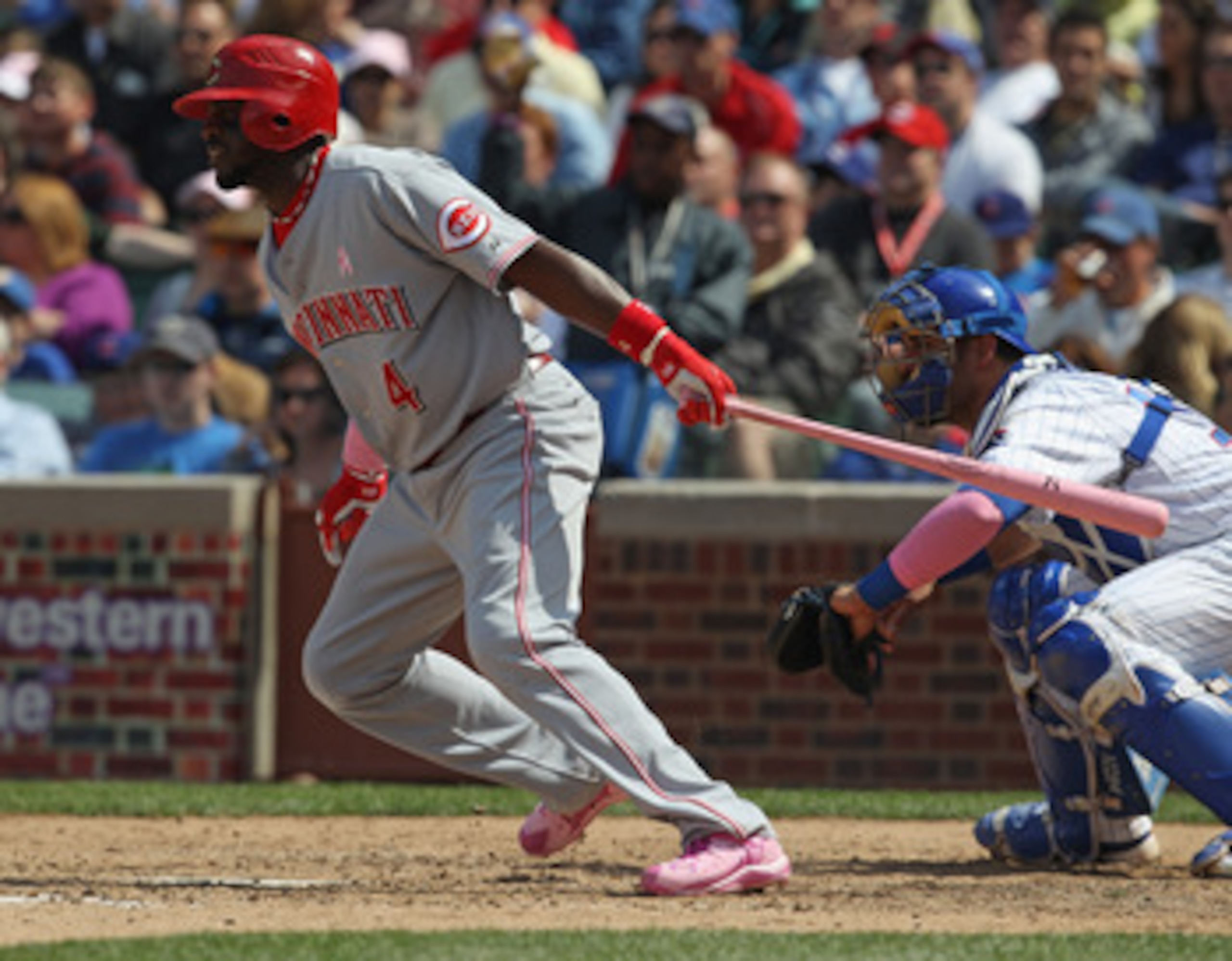 CHICAGO, IL - MAY 08: Brandon Phillips #4 of the Cincinnati Reds hits the ball against the Chicago Cubs at Wrigley Field on May 8, 2011 in Chicago, Illinois. The Reds defeated the Cubs 2-0. (Photo by Jonathan Daniel/Getty Images)