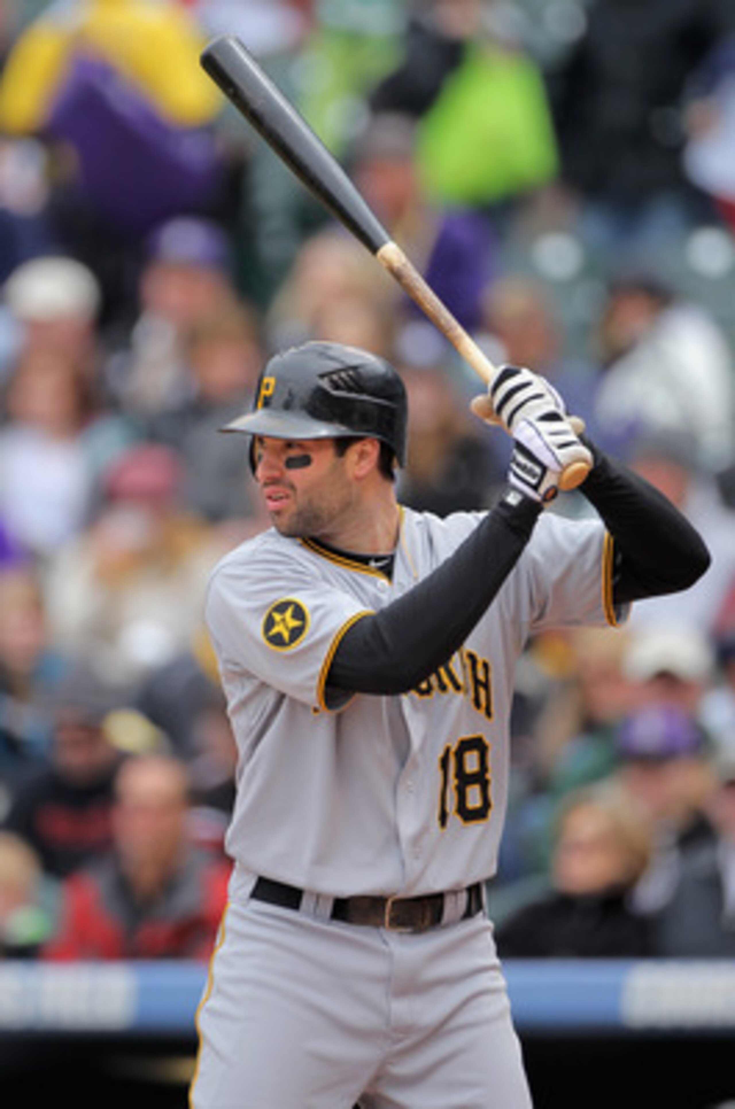 DENVER, CO - MAY 01:  Second baseman Neil Walker #18 of the Pittsburgh Pirates takes an at bat against the Colorado Rockies at Coors Field on May 1, 2011 in Denver, Colorado. The Pirates defeated the Rockies 8-4.  (Photo by Doug Pensinger/Getty Images)
