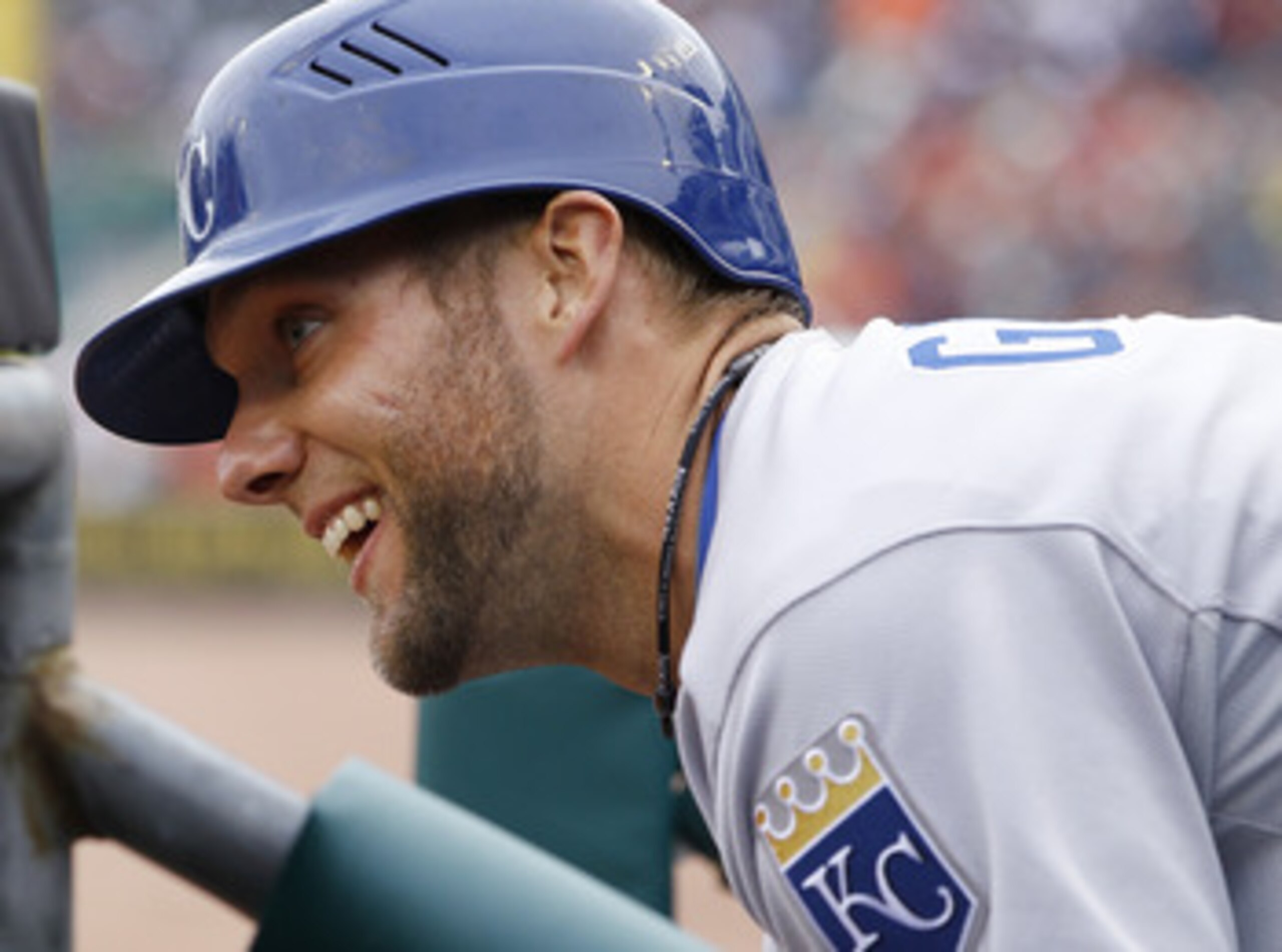 DETROIT, MI - APRIL 08:  Alex Gordon #4 of the Kansas City Royals smiles from the dugout while playing the Detroit Tigers at Comerica Park on April 8, 2011 in Detroit, Michigan.  (Photo by Gregory Shamus/Getty Images)