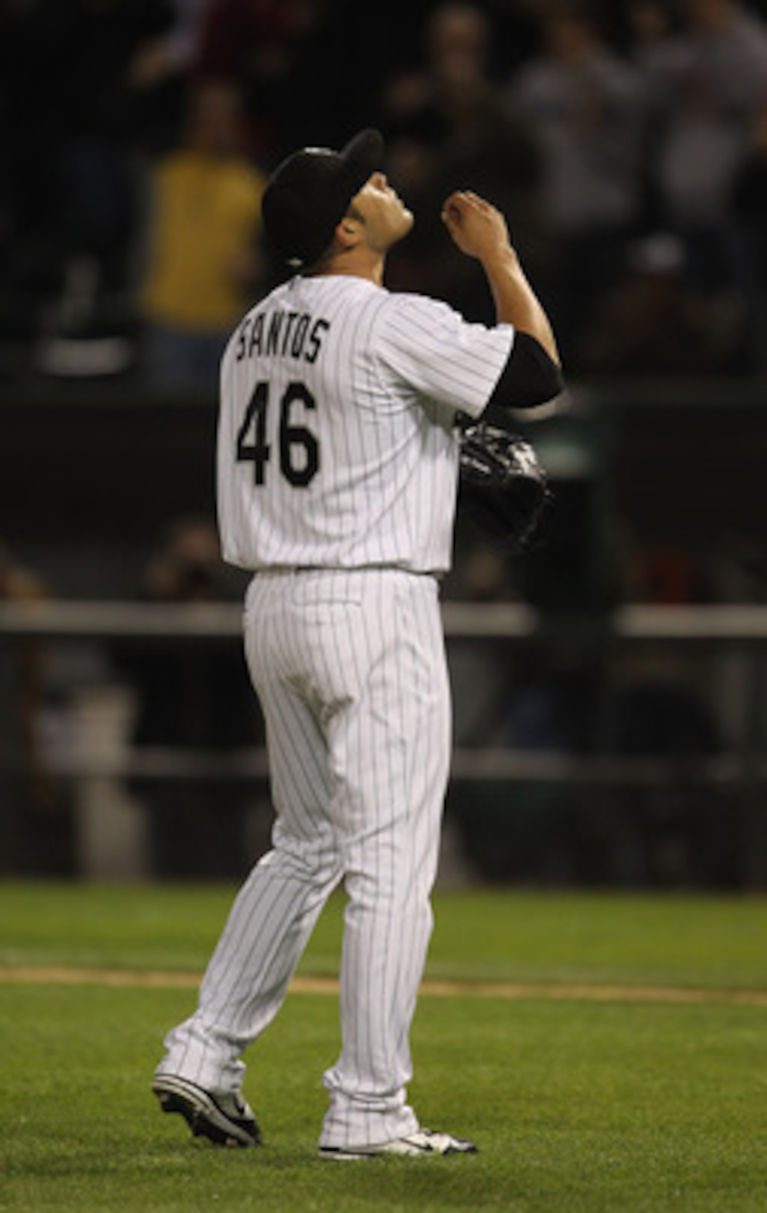 CHICAGO, IL - MAY 17: Sergio Santos #46 of the Chicago White Sox looks to the sky after a win against the Texas Rangers at U.S. Cellular Field on May 17, 2011 in Chicago, Illinois. The White Sox defeated the Rangers 4-3. (Photo by Jonathan Daniel/Getty Im
