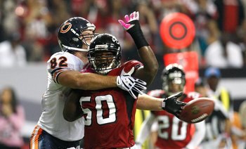 ATLANTA - OCTOBER 18:  Greg Olsen #82 of the Chicago Bears against Curtis Lofton #50 of the Atlanta Falcons at Georgia Dome on October 18, 2009 in Atlanta, Georgia.  (Photo by Kevin C. Cox/Getty Images)