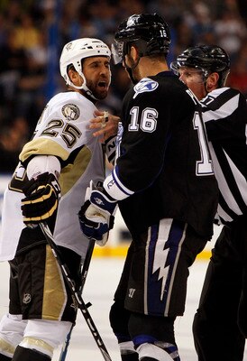 TAMPA, FL - APRIL 25: Maxime Talbot #25 of the Pittsburgh Penguins has a disagreement with Teddy Purcell #16 of the Tampa Bay Lightning in Game Six of the Eastern Conference Quarterfinals during the 2011 NHL Stanley Cup Playoffs at the St. Pete Times Foru