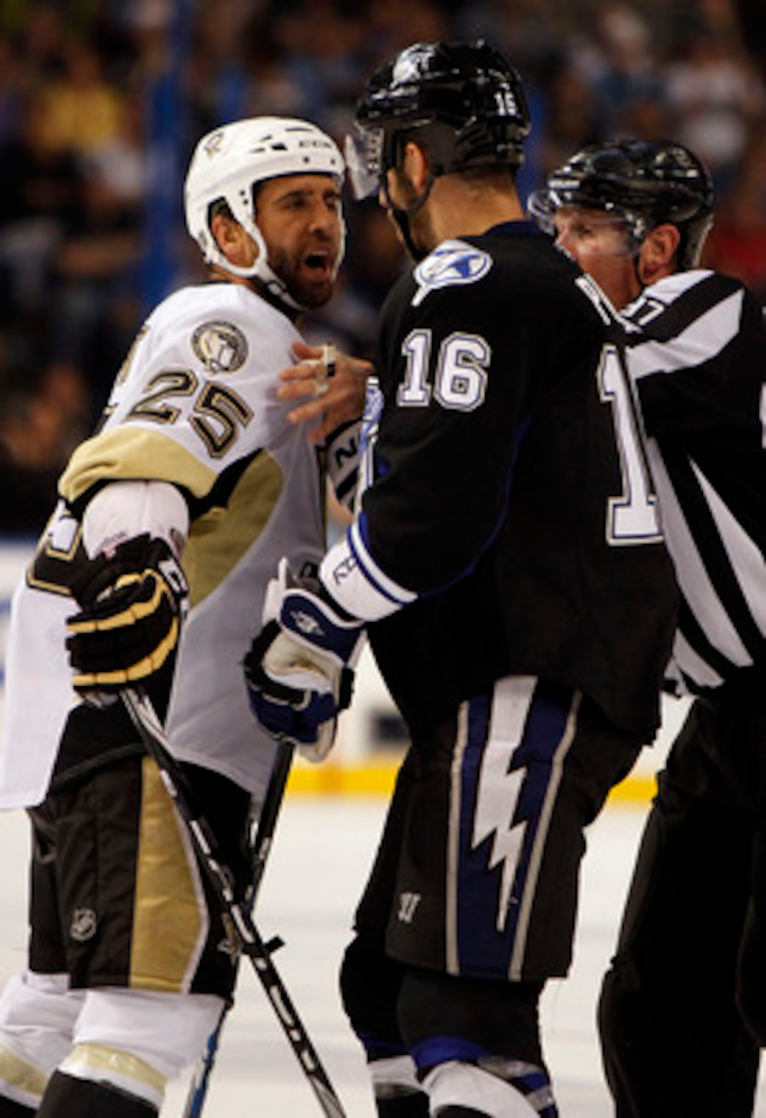 TAMPA, FL - APRIL 25: Maxime Talbot #25 of the Pittsburgh Penguins has a disagreement with Teddy Purcell #16 of the Tampa Bay Lightning in Game Six of the Eastern Conference Quarterfinals during the 2011 NHL Stanley Cup Playoffs at the St. Pete Times Foru