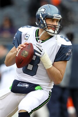 CHICAGO, IL - JANUARY 16:  Quarterback Matt Hasselbeck #8 of the Seattle Seahawks looks to throw the ball during pregame before taking on the Chicago Bears in the 2011 NFC divisional playoff game at Soldier Field on January 16, 2011 in Chicago, Illinois. 