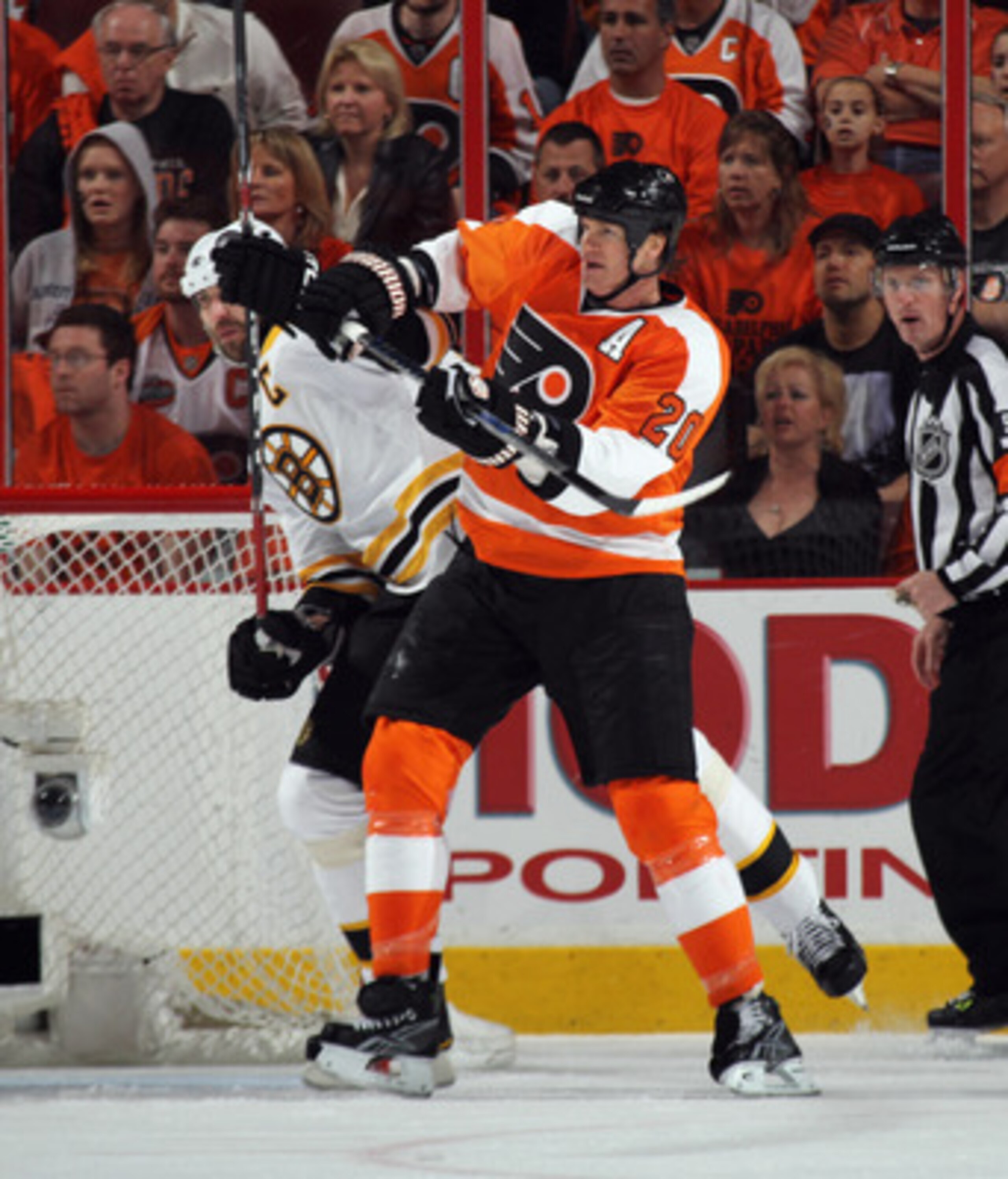 PHILADELPHIA, PA - APRIL 30: Chris Pronger #20 of the Philadelphia Flyers hits Zdeno Chara #33 of the Boston Bruins in Game One of the Eastern Conference Semifinals during the 2011 NHL Stanley Cup Playoffs at the Wells Fargo Center on April 30, 2011 in Ph