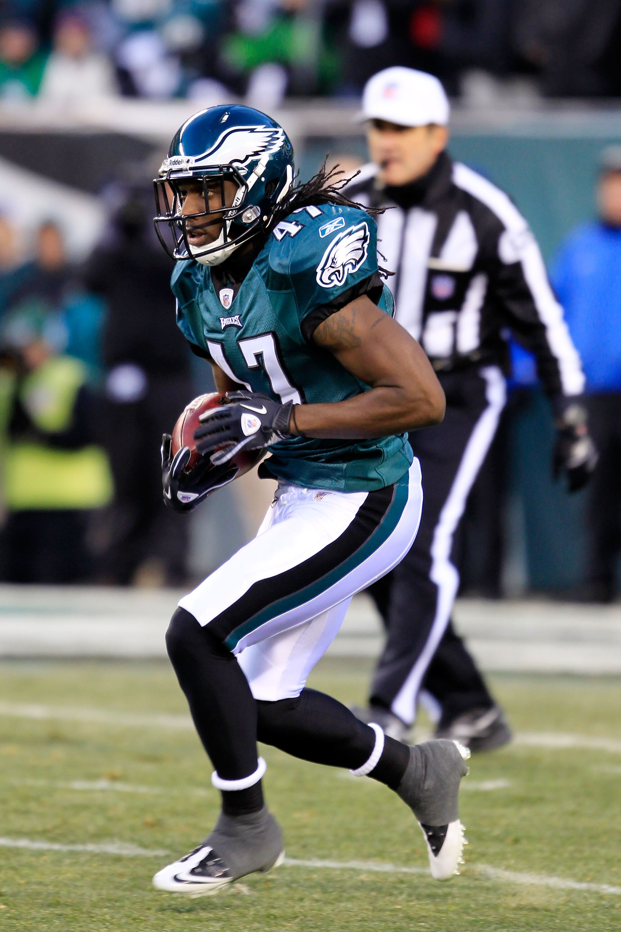 PHILADELPHIA, PA - JANUARY 09:  Gerard Lawson #47 of the Philadelphia Eagles runs down field against the Green Bay Packers during the 2011 NFC wild card playoff game at Lincoln Financial Field on January 9, 2011 in Philadelphia, Pennsylvania.  (Photo by C
