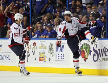 TAMPA, FL - MAY 03: Alex Ovechkin #8 of the Washington Capitals scores a power play goal at 17:27 of the second period against the Tampa Bay Lightning and is joined by Mike Green #52 in Game Three of the Eastern Conference Semifinals during the 2011 NHL S