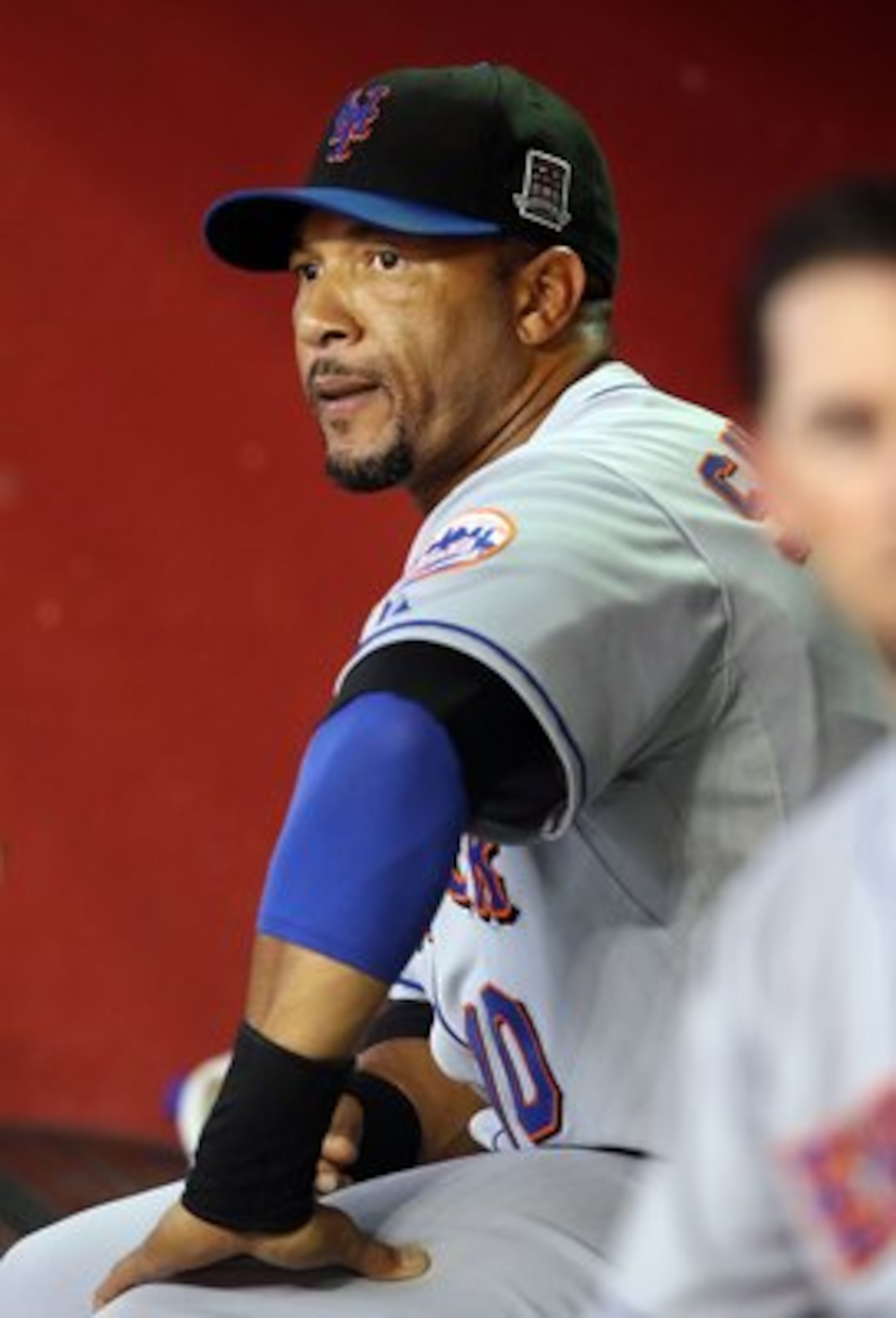 PHOENIX - AUGUST 11:  Gary Sheffield #10 of the New York Mets sits in dugout during the major league baseball game against the Arizona Diamondbacks at Chase Field on August 11, 2009 in Phoenix, Arizona.  The Diamondbacks defeated the Mets 6-2.  (Photo by