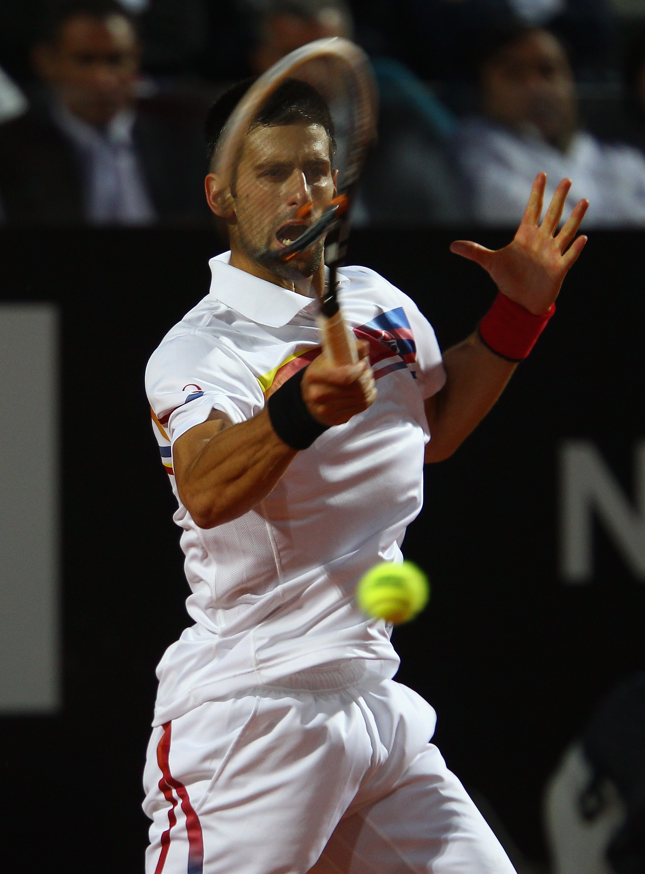 ROME, ITALY - MAY 15: Novak Djokovic of Serbia in action during the final against Rafael Nadal of Spain during day eight of the Internazoinali BNL D'Italia at the Foro Italico Tennis Centre on May 15, 2011 in Rome, Italy. (Photo by Clive Brunskill/Getty ROME, ITALY - MAY 15: Novak Djokovic of Serbia in action during the final against Rafael Nadal of Spain during day eight of the Internazoinali BNL D'Italia at the Foro Italico Tennis Centre on May 15, 2011 in Rome, Italy. (Photo by Clive Brunskill/Getty