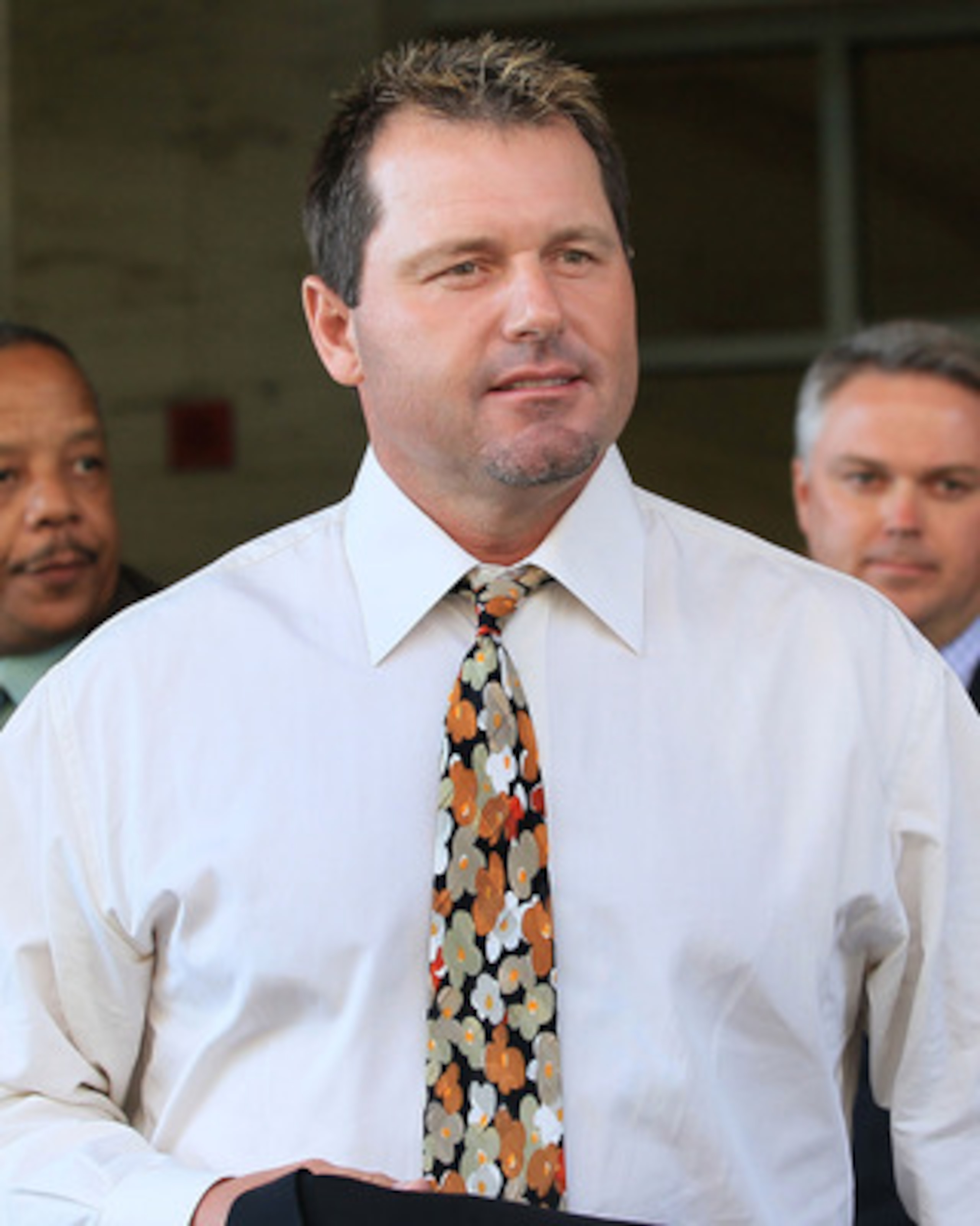 WASHINGTON - AUGUST 30:  Baseball pitching star Roger Clemens walks out of the U.S. District Court after his arraignment, on August 30, 2010 in Washington, DC. Clemens who plead not-guilty was charged with making false statements, perjury and obstructing
