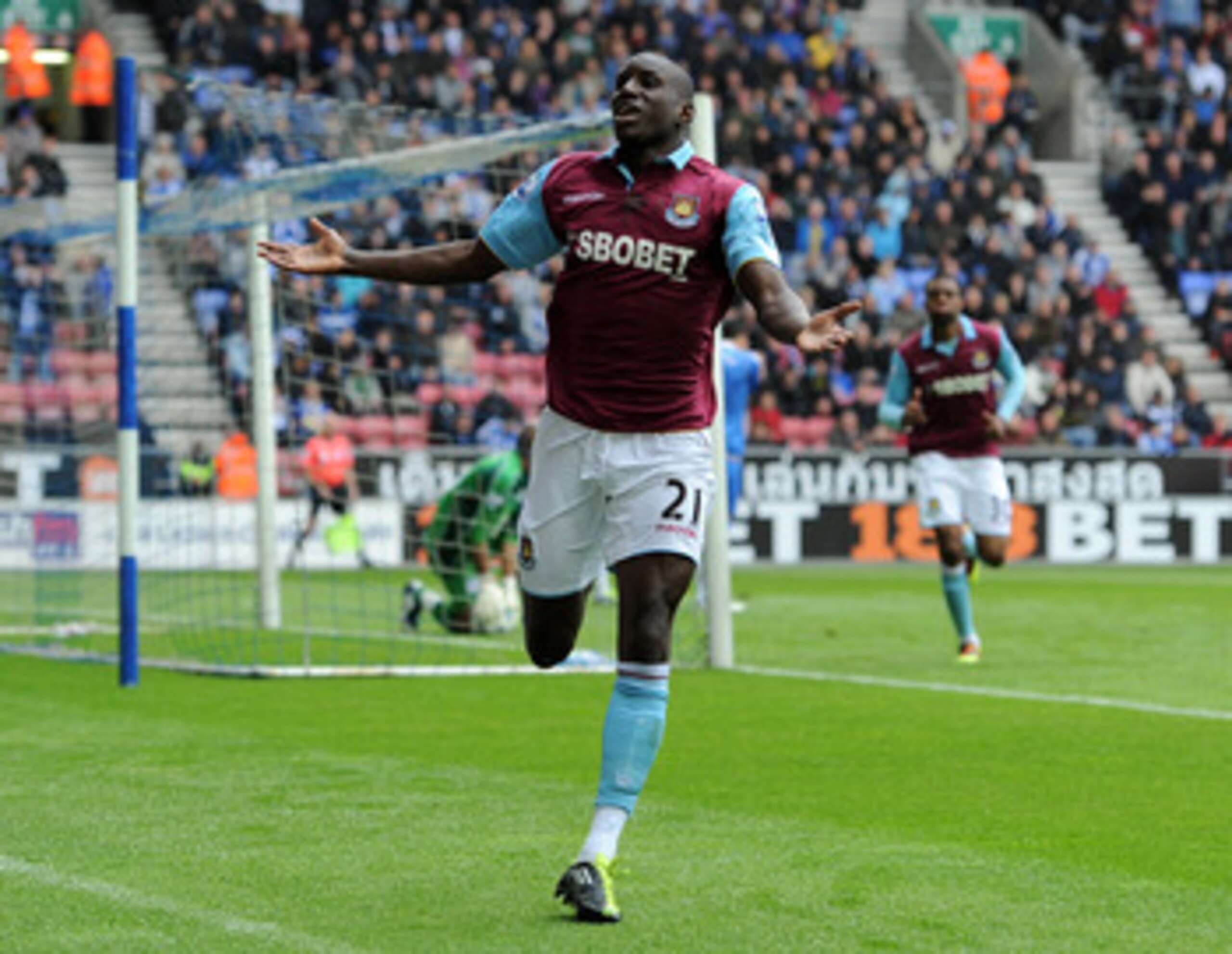 WIGAN, ENGLAND - MAY 15: Demba Ba of West Ham United celebrates scoring the openng goal during the Barclays Premier League match between Wigan Athletic and West Ham United at the DW Stadium on May 15, 2011 in Wigan, England. (Photo by Chris Brunskill/Ge WIGAN, ENGLAND - MAY 15: Demba Ba of West Ham United celebrates scoring the openng goal during the Barclays Premier League match between Wigan Athletic and West Ham United at the DW Stadium on May 15, 2011 in Wigan, England. (Photo by Chris Brunskill/Ge