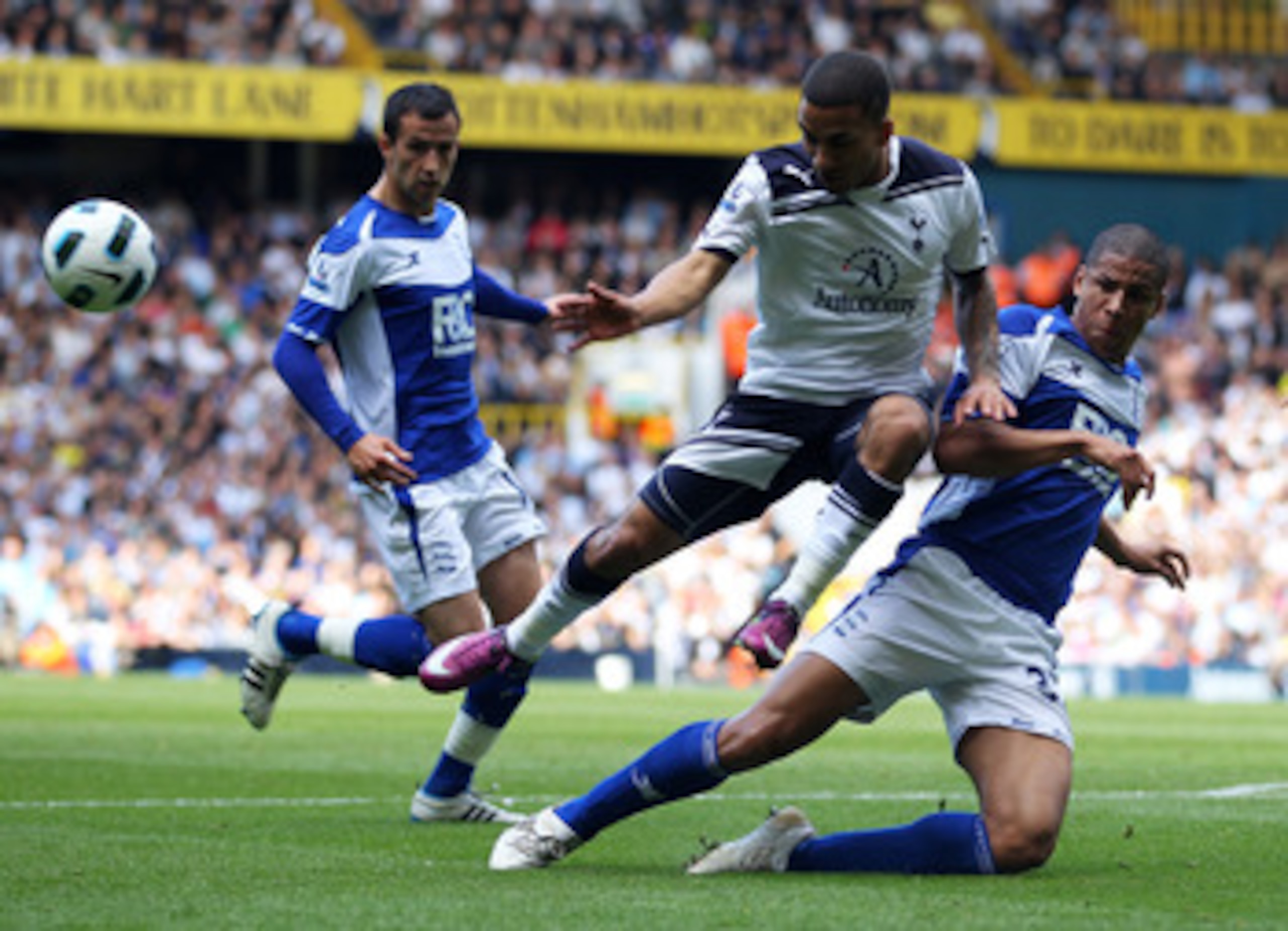 LONDON, ENGLAND - MAY 22: Aaron Lennon of Tottenham Hotspur is challenged by Curtis Davies of Birmingham City during the Barclays Premier League match between Tottenham Hotspur and Birmingham City at White Hart Lane on May 22, 2011 in London, England. ( LONDON, ENGLAND - MAY 22: Aaron Lennon of Tottenham Hotspur is challenged by Curtis Davies of Birmingham City during the Barclays Premier League match between Tottenham Hotspur and Birmingham City at White Hart Lane on May 22, 2011 in London, England. (