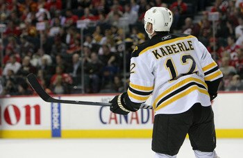 CALGARY,CANADA - FEBRUARY 22:  Tomas Kaberle #12 of the Boston Bruins skates against the Calgary Flames during their NHL game at Scotiabank Saddledome, February 22,2011 in Calgary, Alberta, Canada.(Photo By Dave Sandford/Getty Images)