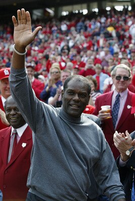 ST. LOUIS - MARCH 31:  Hall of Famer Bob Gibson of the St. Louis Cardinals (1959-75) waves to the crowd during opening day ceremonies before the game against the Milwaukee Brewers at Busch Stadium on March 31, 2003 in St. Louis, Missouri.  The Cardinals w