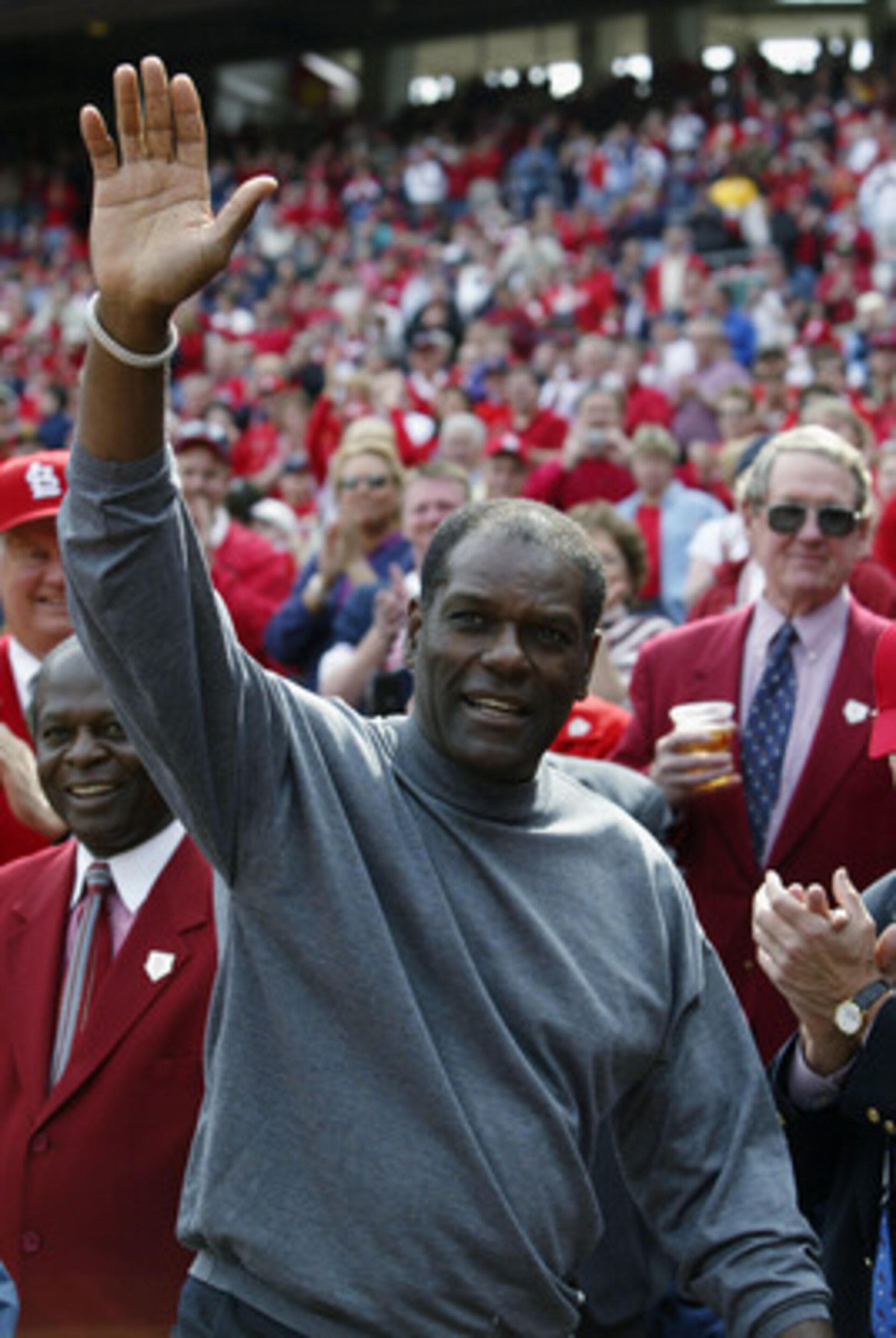 ST. LOUIS - MARCH 31:  Hall of Famer Bob Gibson of the St. Louis Cardinals (1959-75) waves to the crowd during opening day ceremonies before the game against the Milwaukee Brewers at Busch Stadium on March 31, 2003 in St. Louis, Missouri.  The Cardinals w