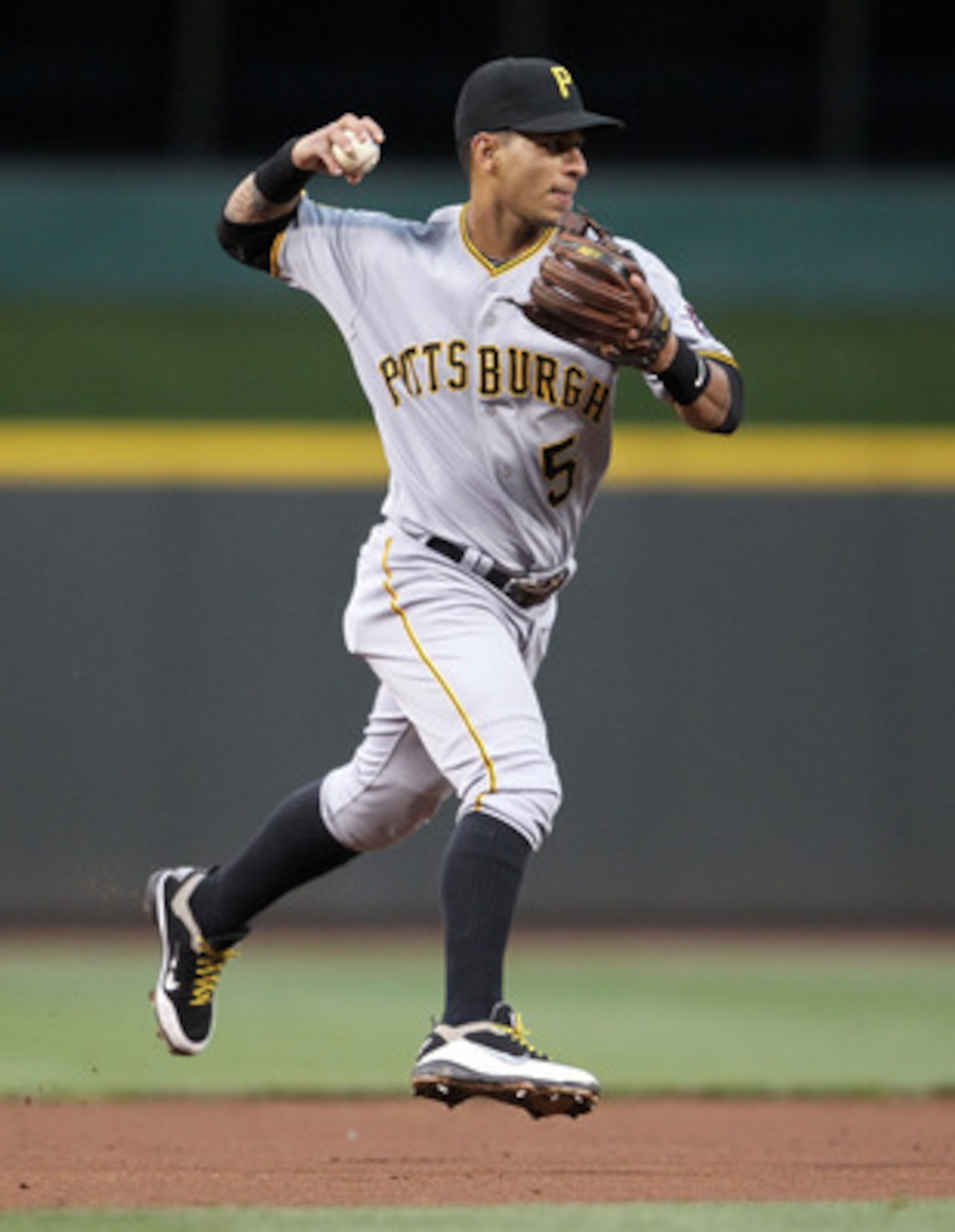 CINCINNATI, OH - MAY 18: Ronny Cedeno #5 of the Pittsburgh Pirates throws to first base for an out during the game against the Cincinnati Reds at Great American Ball Park on May 18, 2011 in Cincinnati, Ohio.  (Photo by Andy Lyons/Getty Images)