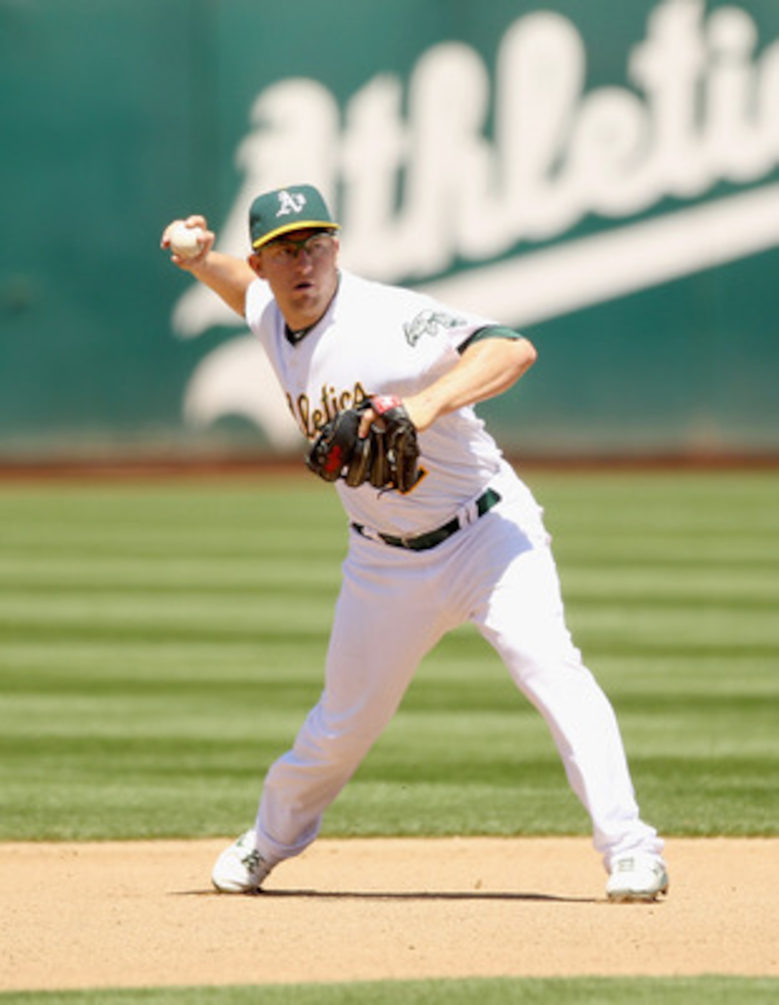 OAKLAND, CA - APRIL 30:  Cliff Pennington #2 of the Oakland Athletics in action against the Texas Rangers at Oakland-Alameda County Coliseum on April 30, 2011 in Oakland, California.  (Photo by Ezra Shaw/Getty Images)