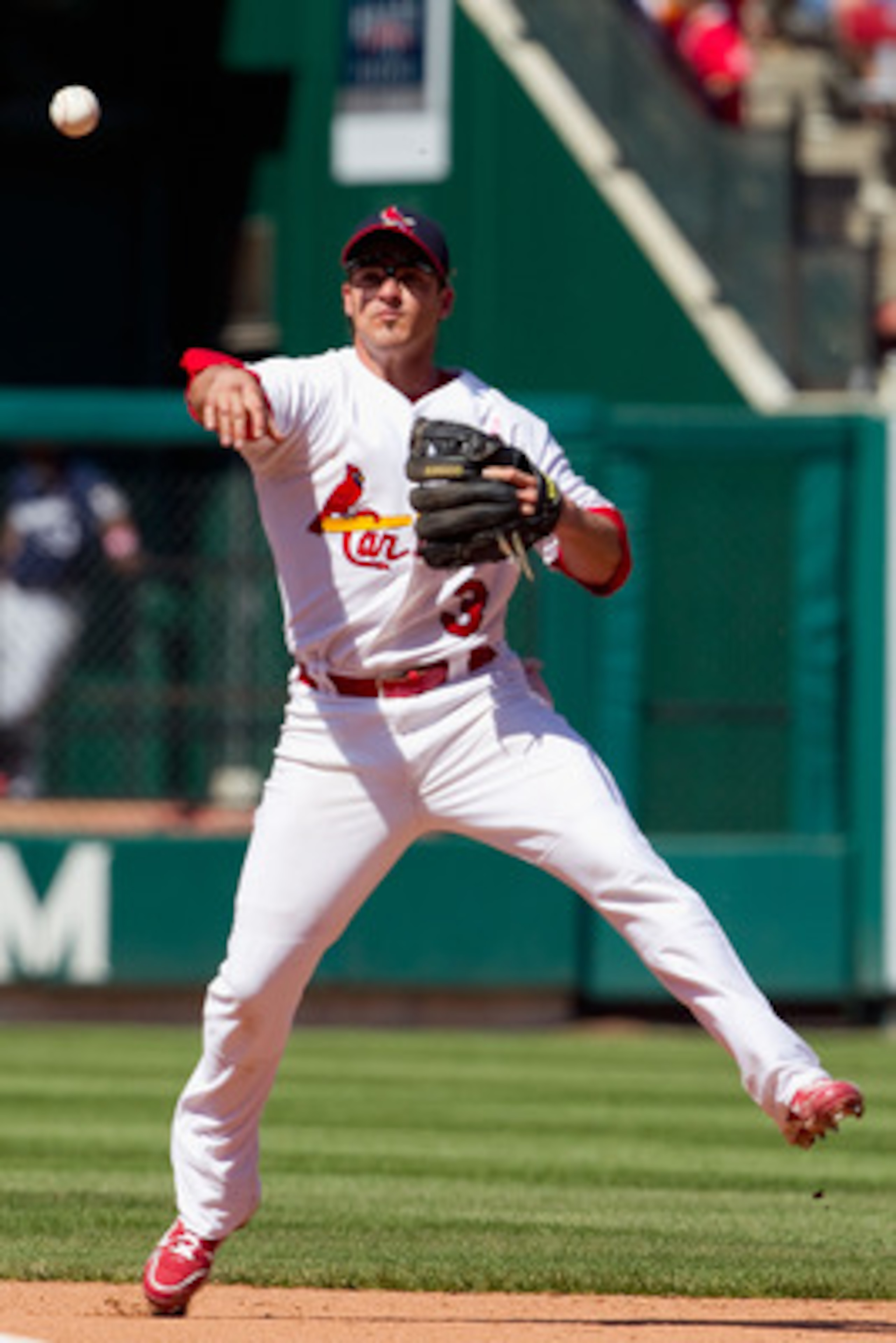 ST. LOUIS, MO - MAY 8: Ryan Theriot #3 of the St. Louis Cardinals throws to first base against the Milwaukee Brewers at Busch Stadium on May 8, 2011 in St. Louis, Missouri.  (Photo by Dilip Vishwanat/Getty Images)