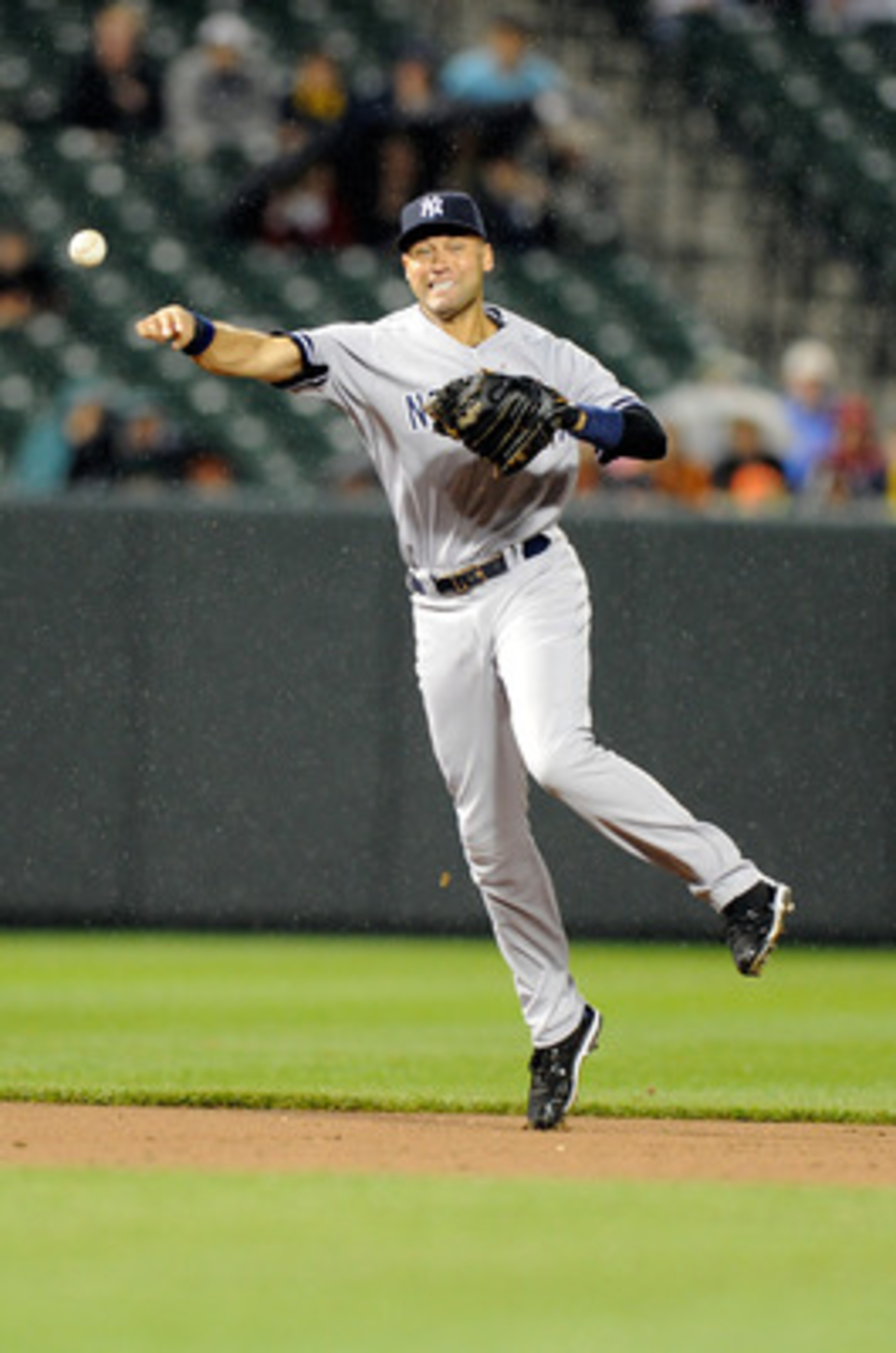 BALTIMORE, MD - MAY 19:  Derek Jeter #2 of the New York Yankees throws the ball to first base during the game against the Baltimore Orioles at Oriole Park at Camden Yards on May 19, 2011 in Baltimore, Maryland. Jeter was given an error on the throw. (Phot