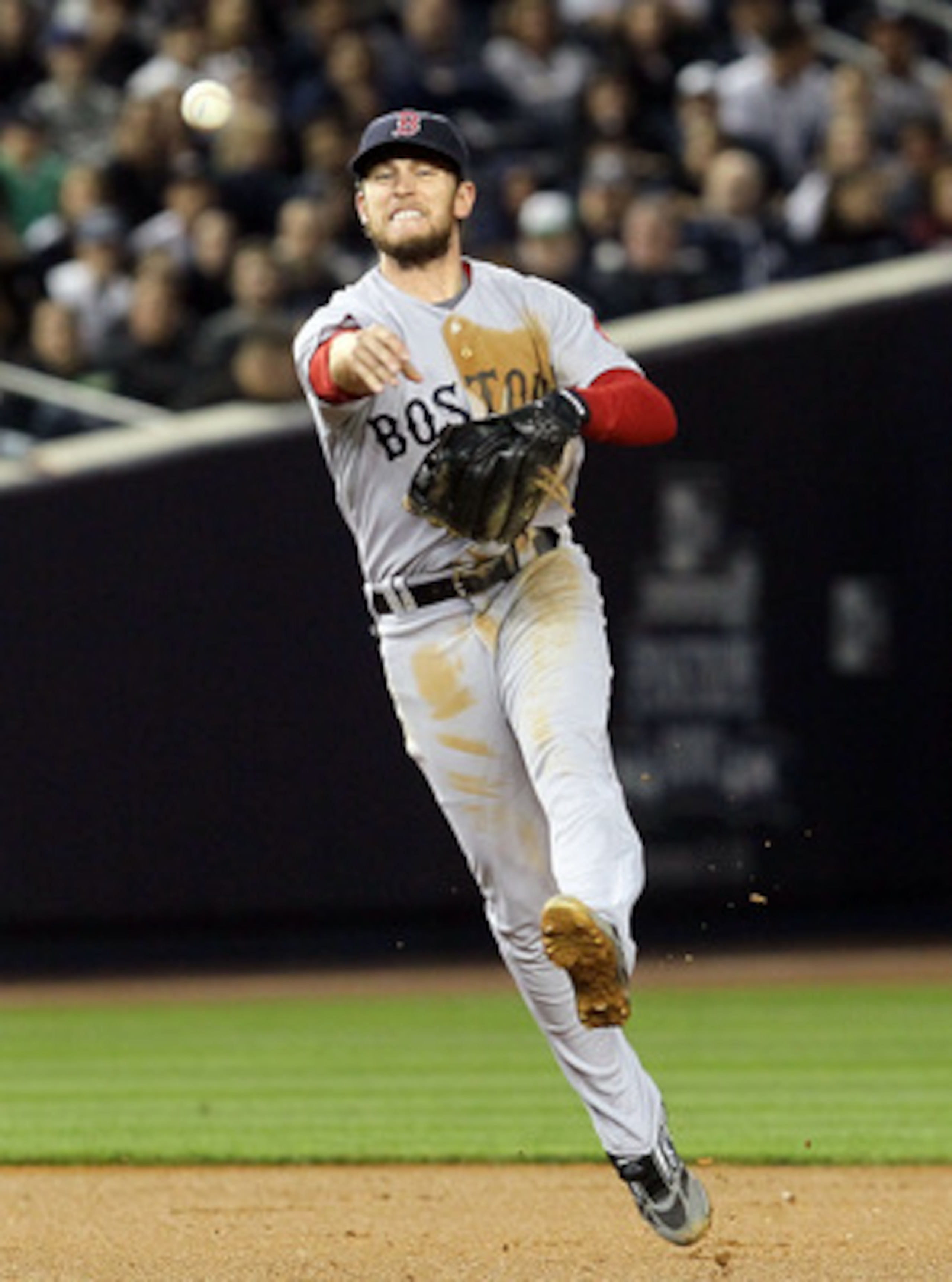 NEW YORK, NY - MAY 14:  Jed Lowrie #12 of the Boston Red Sox throws out Derek Jeter (not pictured) of the New York Yankees in the third inning on May 14, 2011 at Yankee Stadium in the Bronx borough of New York City.  (Photo by Jim McIsaac/Getty Images)