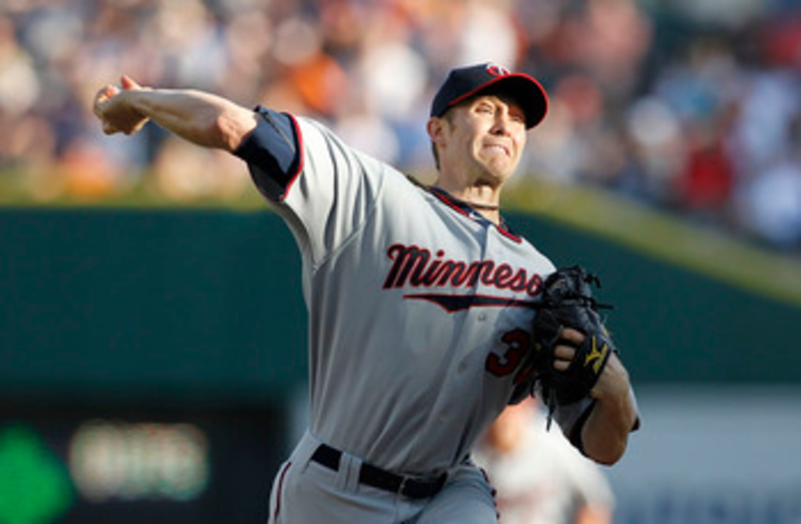 DETROIT - JUNE 01:  Scott Baker #30 of the Minnesota Twins pitches in the first inning of the game against the Detroit Tigers at Comerica Park on June 1, 2011 in Detroit, Michigan.  (Photo by Leon Halip/Getty Images)