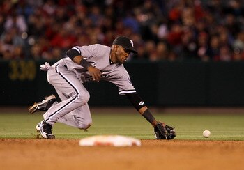 ANAHEIM, CA - MAY 11: Shortstop Alexei Ramirez #10 of the Chicago White Sox can't reach an RBI single hit by Torii Hunter #48 of the Los Angeles Angels of Anaheim on May 11, 2011 at Angel Stadium in Anaheim, California.   (Photo by Stephen Dunn/Getty Imag