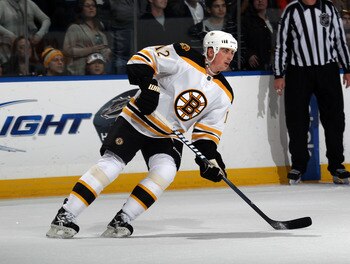 UNIONDALE, NY - MARCH 11:  Tomas Kaberle #12 of the Boston Bruins skates against the New York Islanders at the Nassau Coliseum on March 11, 2011 in Uniondale, New York.  (Photo by Bruce Bennett/Getty Images)