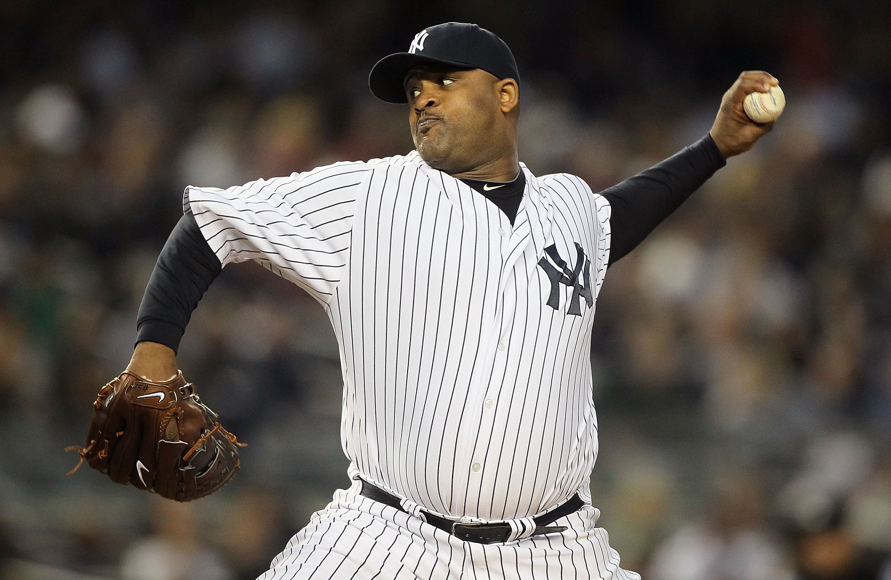 NEW YORK, NY - MAY 14: CC Sabathia #52 of the New York Yankees delivers a pitch against the Boston Red Sox on May 14, 2011 at Yankee Stadium in the Bronx borough of New York City. (Photo by Jim McIsaac/Getty Images) NEW YORK, NY - MAY 14: CC Sabathia #52 of the New York Yankees delivers a pitch against the Boston Red Sox on May 14, 2011 at Yankee Stadium in the Bronx borough of New York City. (Photo by Jim McIsaac/Getty Images)