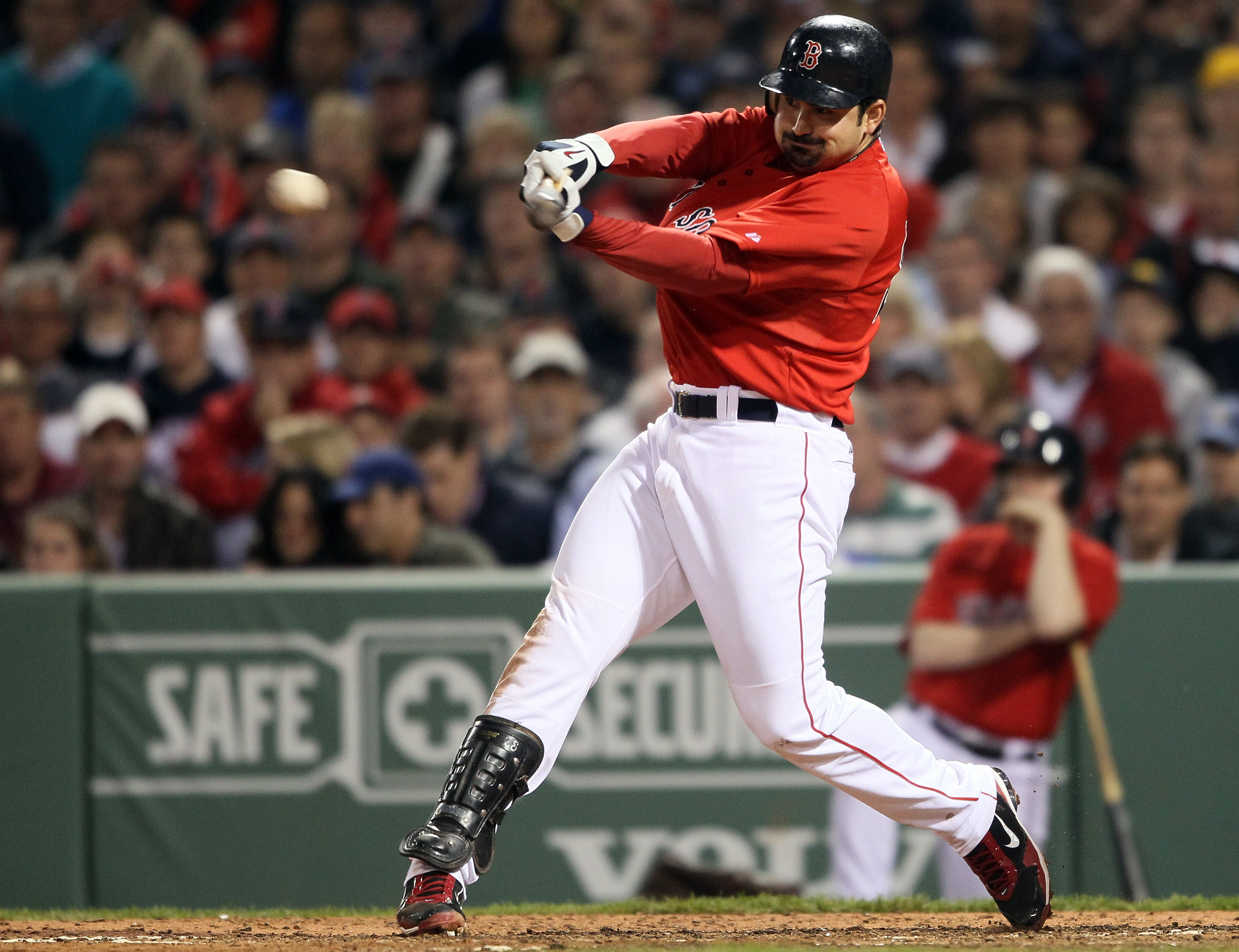 BOSTON, MA - MAY 20: Adrian Gonzalez #28 of the Boston Red Sox hits a 2RBI single in the fourth inning against the Chicago Cubs on May 20, 2011 at Fenway Park in Boston, Massachusetts.on May 20, 2011 at Fenway Park in Boston, Massachusetts. The Chicago C BOSTON, MA - MAY 20: Adrian Gonzalez #28 of the Boston Red Sox hits a 2RBI single in the fourth inning against the Chicago Cubs on May 20, 2011 at Fenway Park in Boston, Massachusetts.on May 20, 2011 at Fenway Park in Boston, Massachusetts. The Chicago C