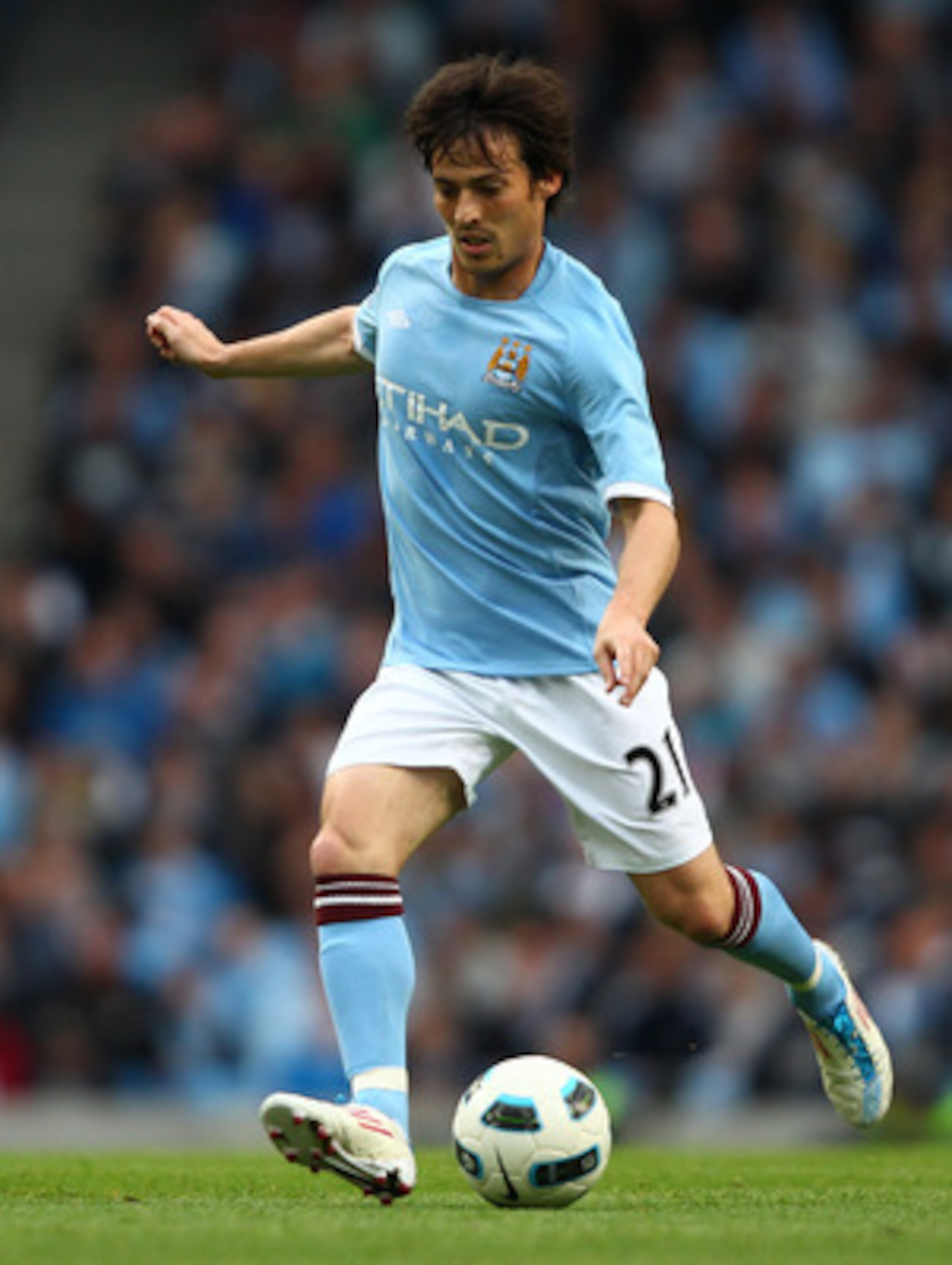 MANCHESTER, ENGLAND - MAY 17: David Silva of Manchester City in action during the Barclays Premier League match between Manchester City and Stoke City at City of Manchester Stadium on May 17, 2011 in Manchester, England.  (Photo by Clive Brunskill/Getty I