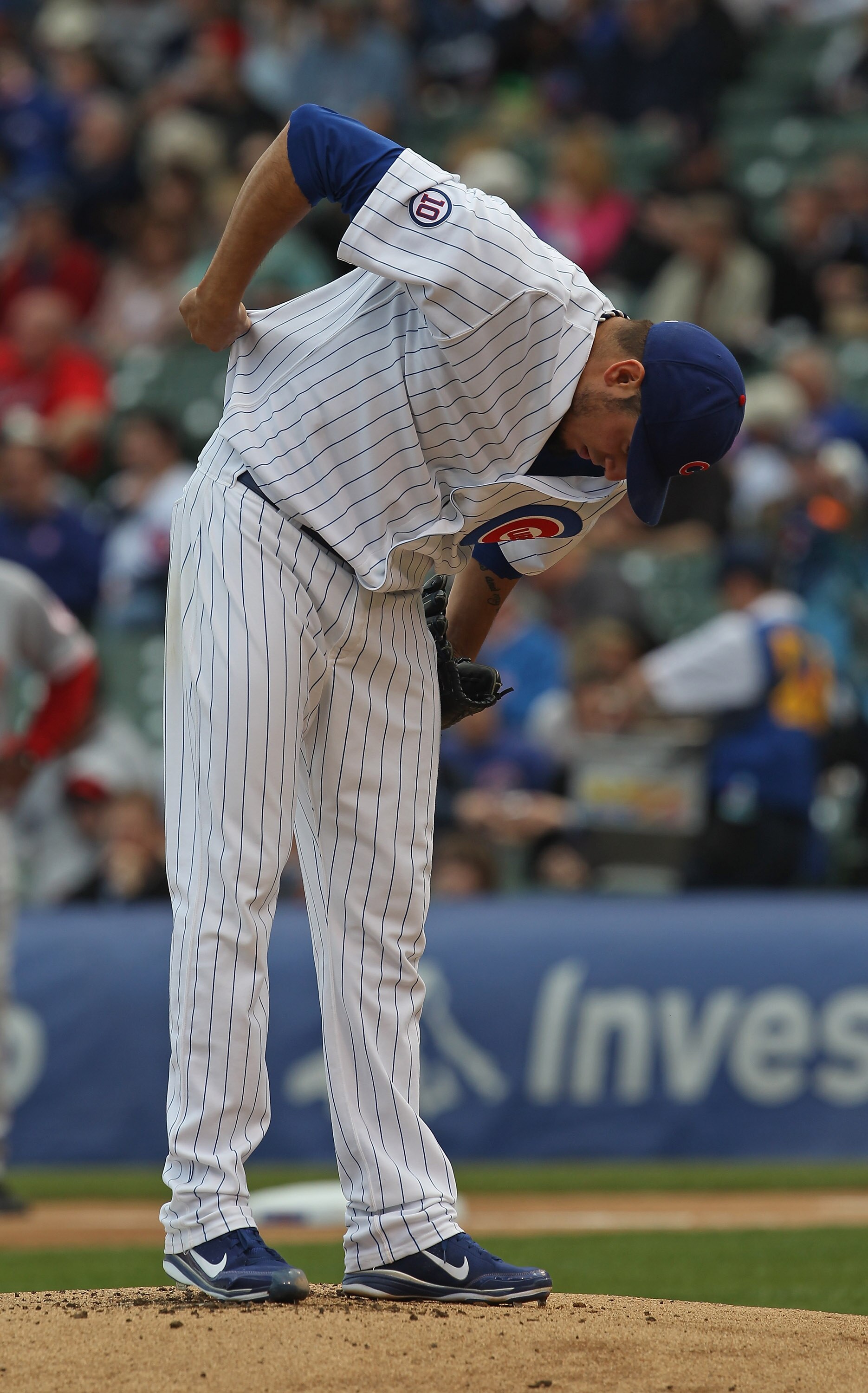 CHICAGO, IL - MAY 06: Starting pitcher Matt Garza #17 of the Chicago Cubs stretches before throwing the first pitch against the Cincinnati Reds at Wrigley Field on May 6, 2011 in Chicago, Illinois. (Photo by Jonathan Daniel/Getty Images) CHICAGO, IL - MAY 06: Starting pitcher Matt Garza #17 of the Chicago Cubs stretches before throwing the first pitch against the Cincinnati Reds at Wrigley Field on May 6, 2011 in Chicago, Illinois. (Photo by Jonathan Daniel/Getty Images)