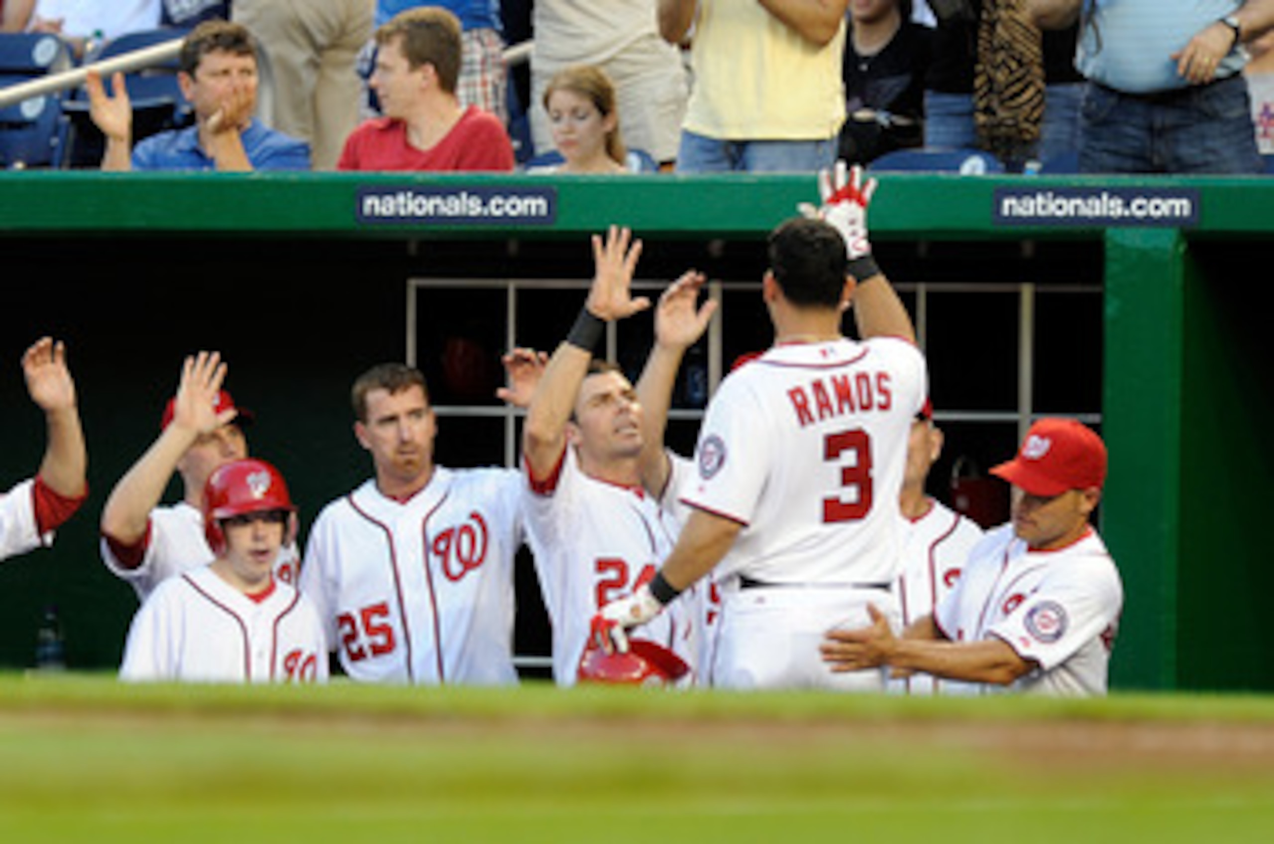 WASHINGTON, DC - APRIL 26: Wilson Ramos #3 of the Washington Nationals is congratulated by teammates after hitting a home run in the second inning against the New York Mets at Nationals Park on April 26, 2011 in Washington, DC. (Photo by Greg Fiume/Gett WASHINGTON, DC - APRIL 26: Wilson Ramos #3 of the Washington Nationals is congratulated by teammates after hitting a home run in the second inning against the New York Mets at Nationals Park on April 26, 2011 in Washington, DC. (Photo by Greg Fiume/Gett
