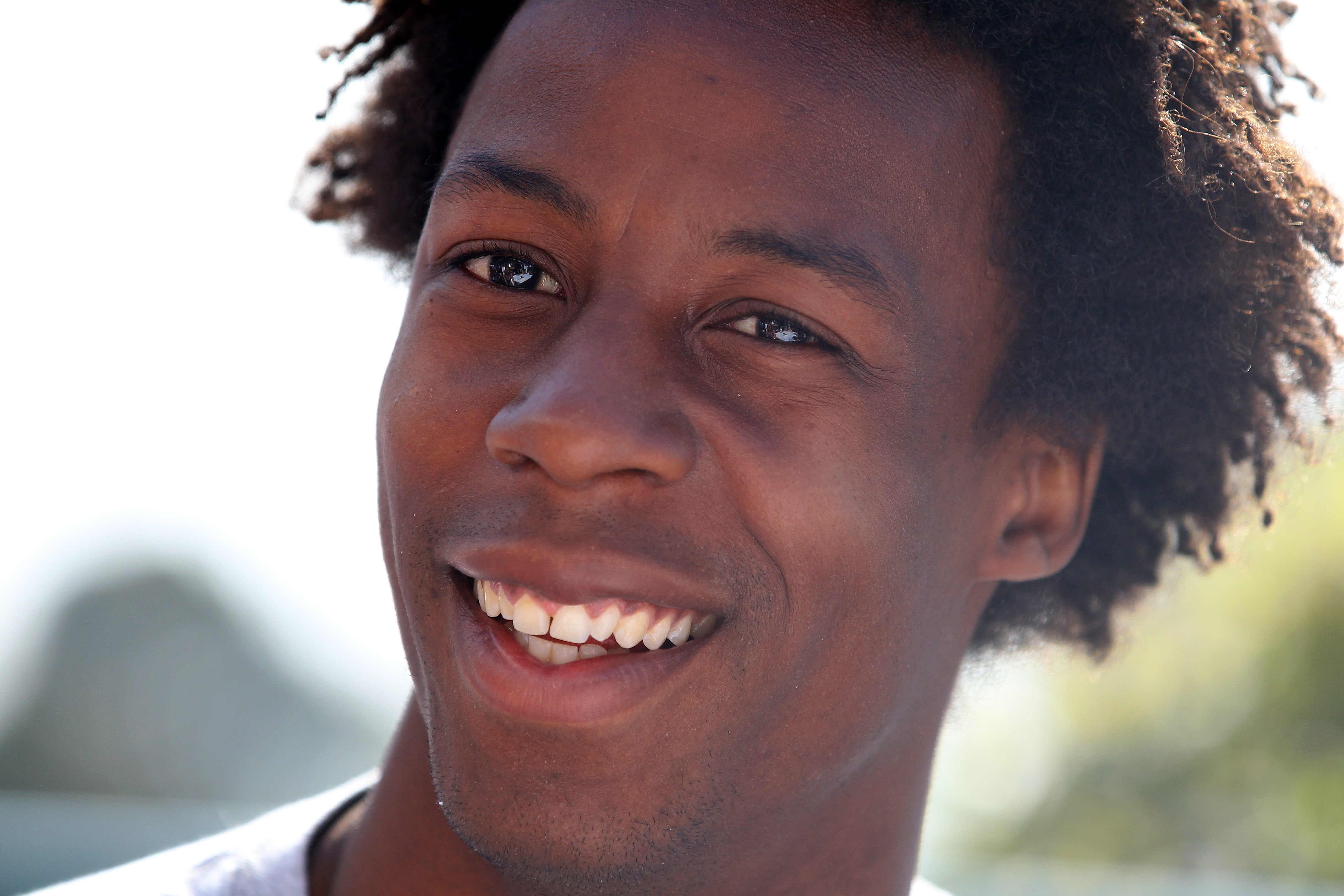 MONACO - APRIL 11:  Gael Monfils of France talks to the media during Day Two of the ATP Masters Series Tennis at the Monte Carlo Country Club on April 11, 2011 in Monte Carlo, Monaco.  (Photo by Julian Finney/Getty Images)