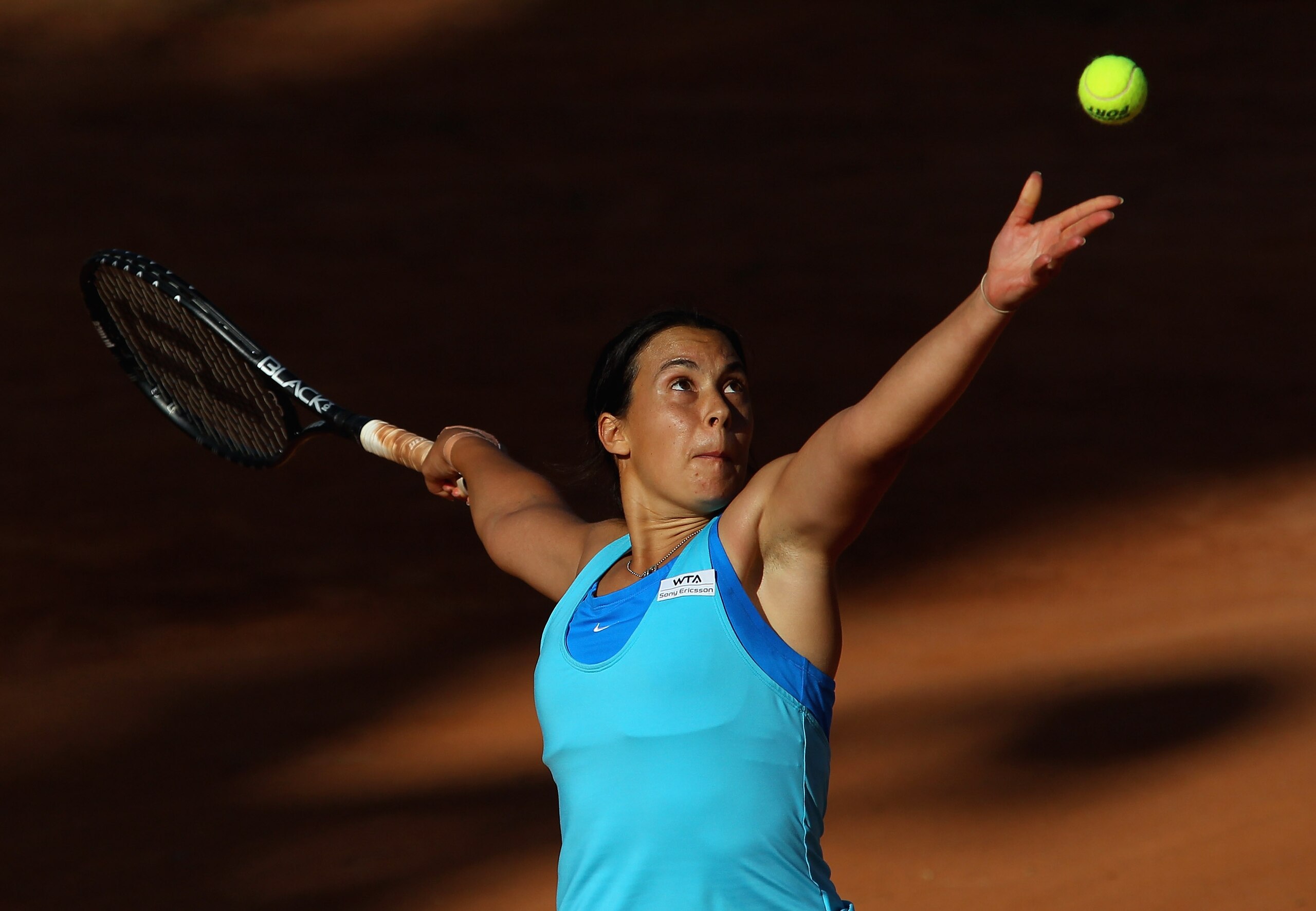 ROME, ITALY - MAY 09:  Marion Bartoli of France serves during her first round victory over Arantxa Parra Santonja of Spain during day two of the Internazionali BNL d'Italia at the Foro Italico Tennis Centre on May 9, 2011 in Rome, Italy.  (Photo by Alex L