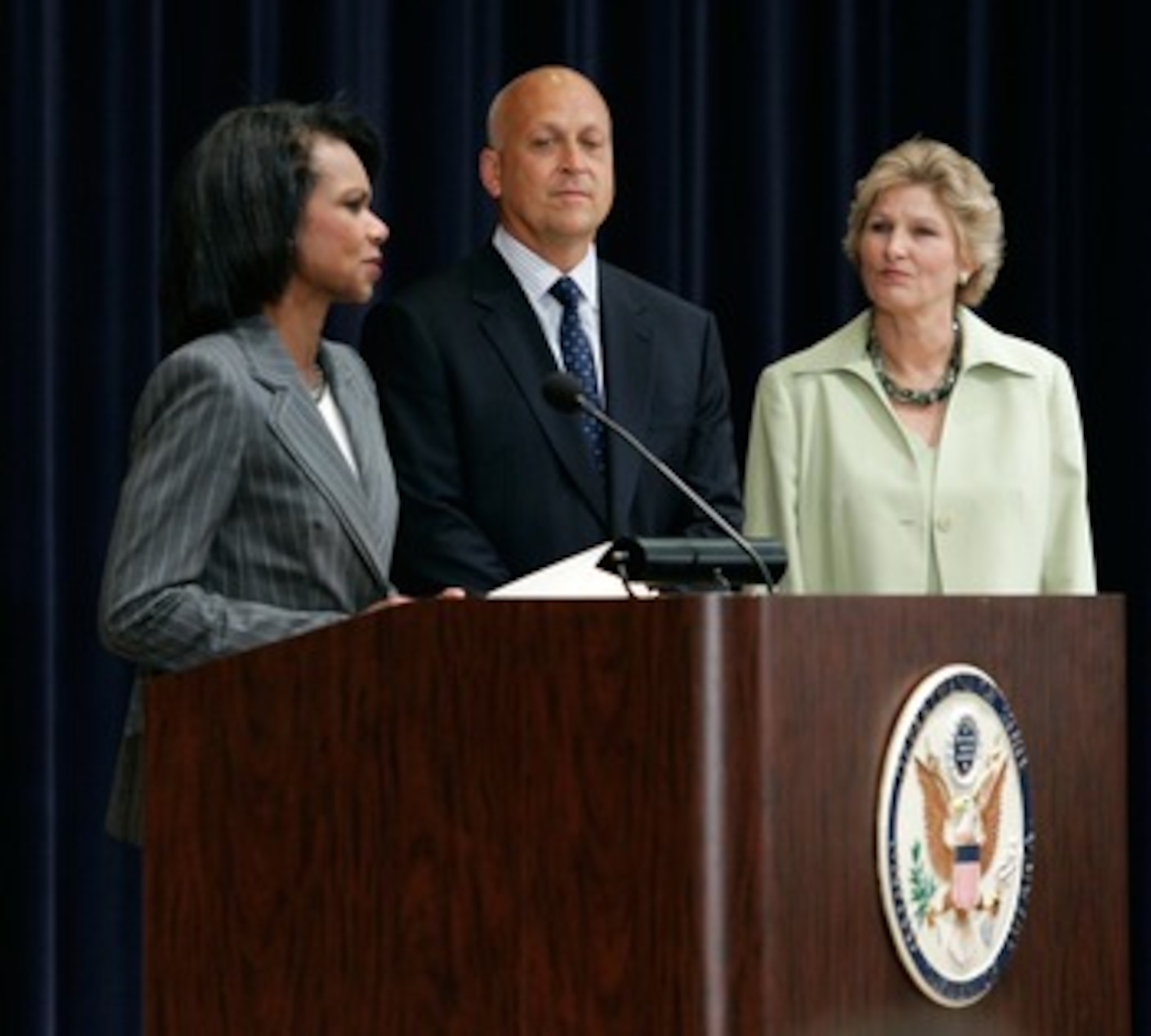 WASHINGTON - AUGUST 13:  (L-R) U.S. Secretary of State Condoleezza Rice speaks as Baseball Hall of Famer Cal Ripken Jr. and Under Secretary of State for Public Diplomacy and Public Affairs and the Bureau of Educational and Cultural Affairs Karen Hughes lo