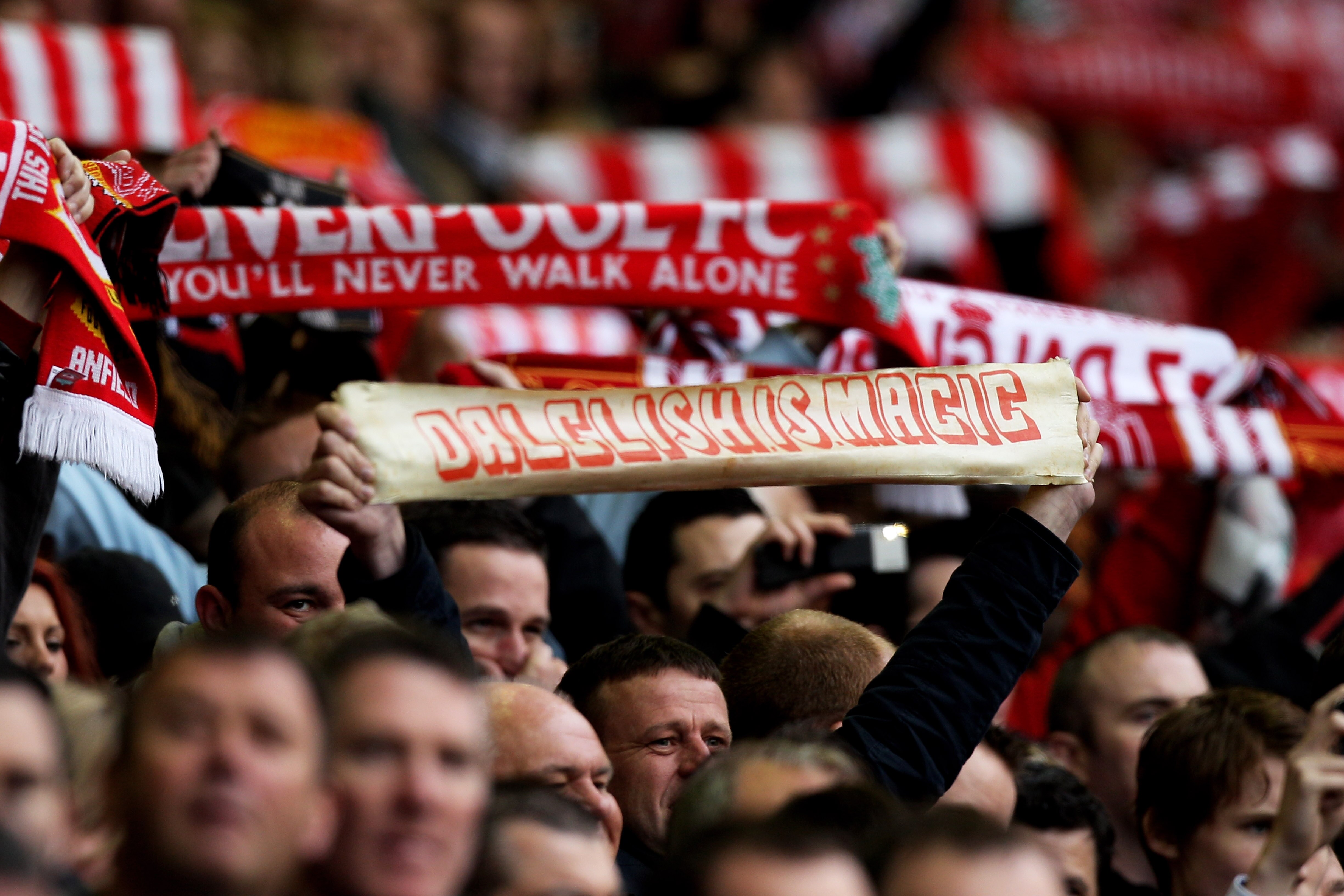 LIVERPOOL, ENGLAND - MAY 15:  Liverpool fans cheer on their team during the Barclays Premier League match between Liverpool and Tottenham Hotspur at Anfield on May 15, 2011 in Liverpool, England.  (Photo by Michael Steele/Getty Images)
