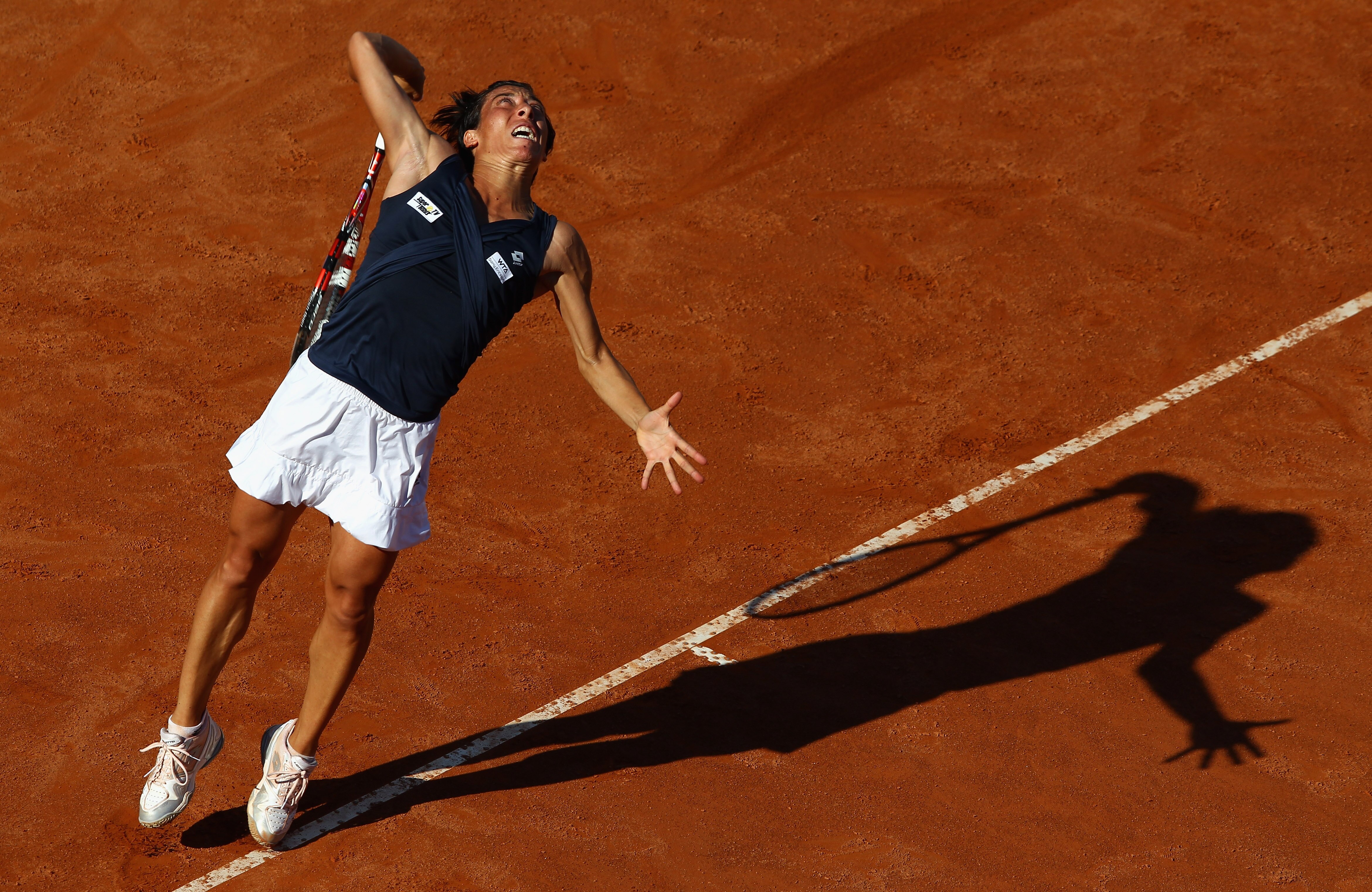 ROME, ITALY - MAY 13:  Francesca Schiavone of Italy serves during her quarter final match against Samantha Stosur of Australia  during day six of the Internazoinali BNL D'Italia at the Foro Italico Tennis Centre  on May 13, 2011 in Rome, Italy.  (Photo by