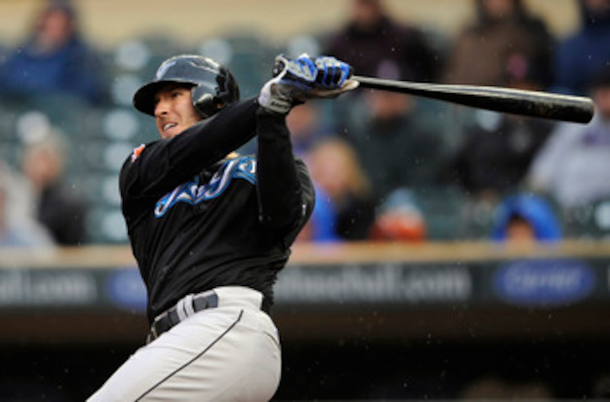 MINNEAPOLIS, MN - MAY 14: J.P. Arencibia #9 of the Toronto Blue Jays hits a two-run double against the Minnesota Twins during the eleventh inning of their game on May 14, 2011 at Target Field in Minneapolis, Minnesota. Blue Jays defeated the Twins 9-3 in MINNEAPOLIS, MN - MAY 14: J.P. Arencibia #9 of the Toronto Blue Jays hits a two-run double against the Minnesota Twins during the eleventh inning of their game on May 14, 2011 at Target Field in Minneapolis, Minnesota. Blue Jays defeated the Twins 9-3 in